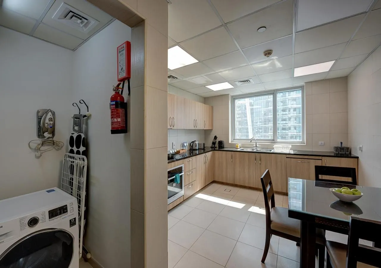 Kitchen or kitchenette in Marina Hotel Apartments