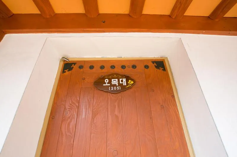 Property logo or sign in Ddlanche Guesthouse New Building