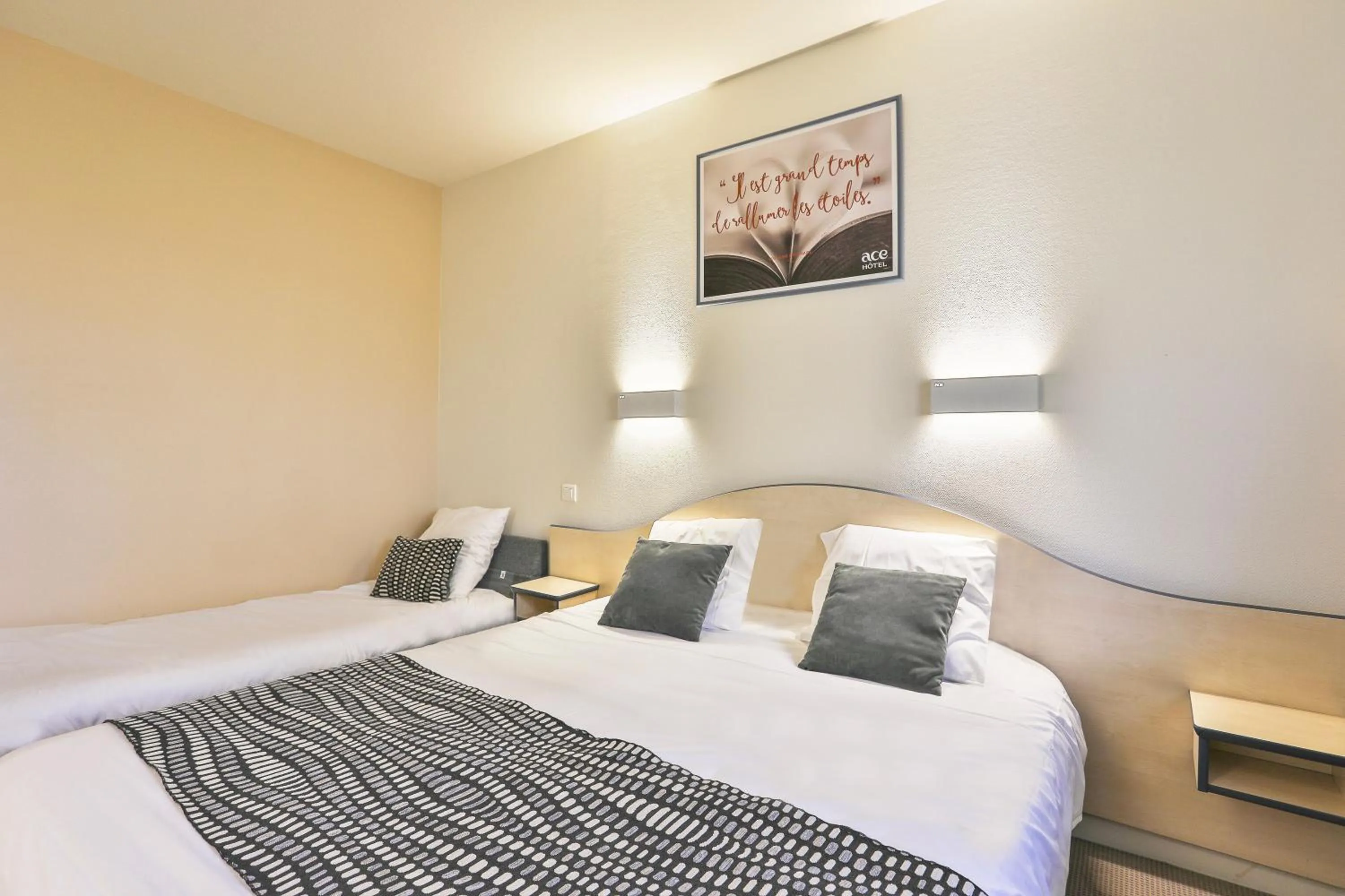 Bed in ACE Hôtel Vendée Saint Hermine