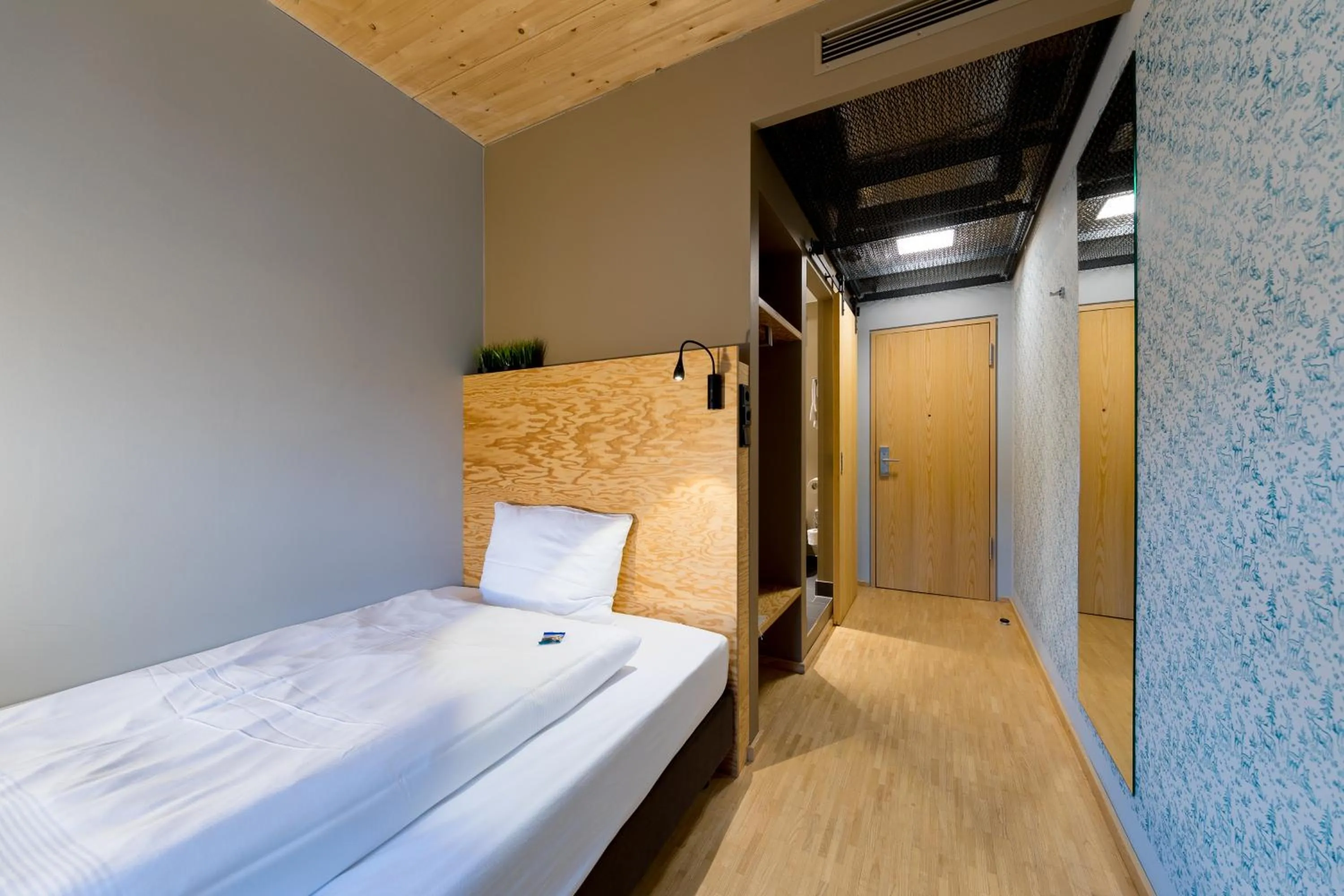 Photo of the whole room, Bed in Schlossparkhotel Mariakirchen