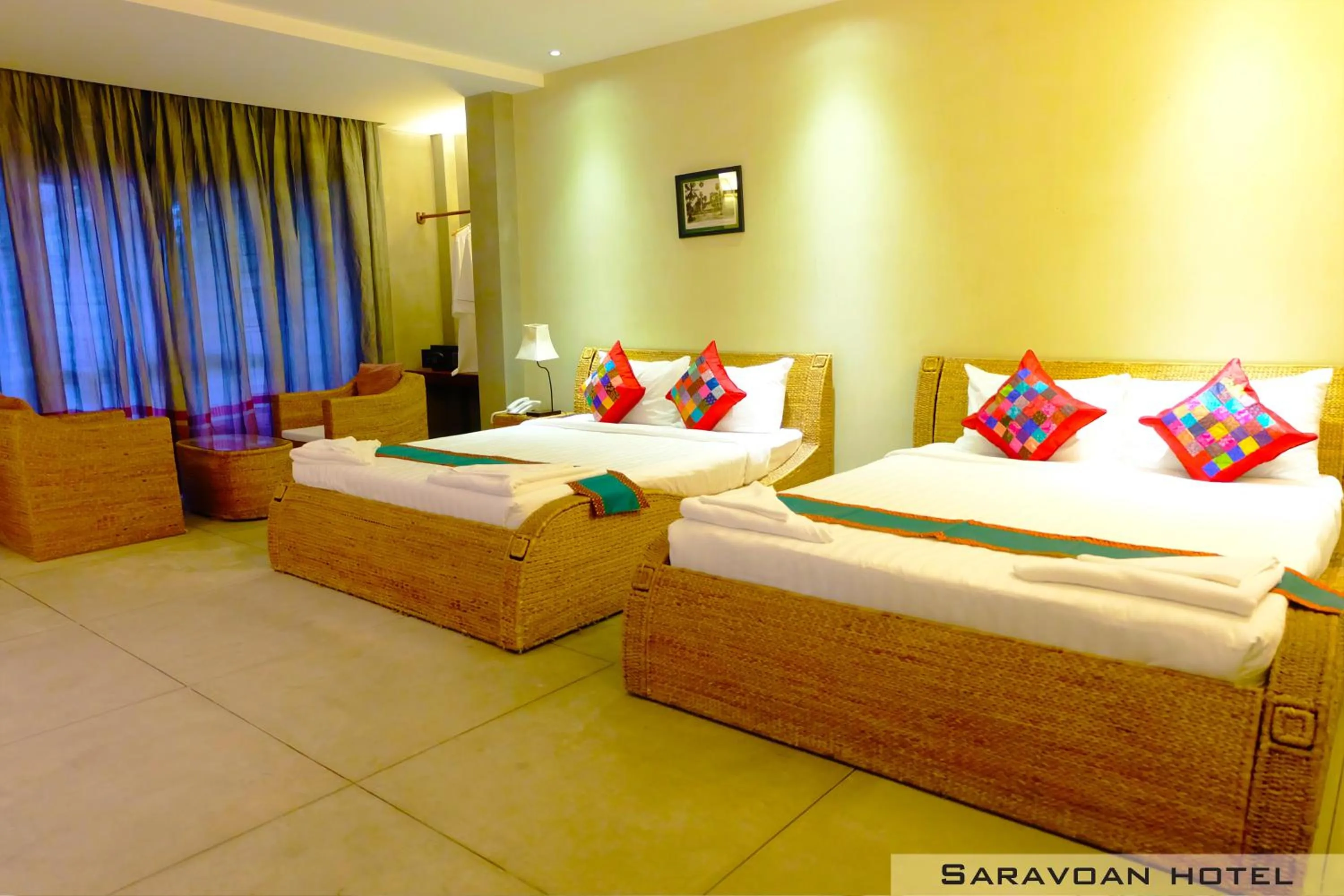 Photo of the whole room, Bed in Saravoan Royal Palace