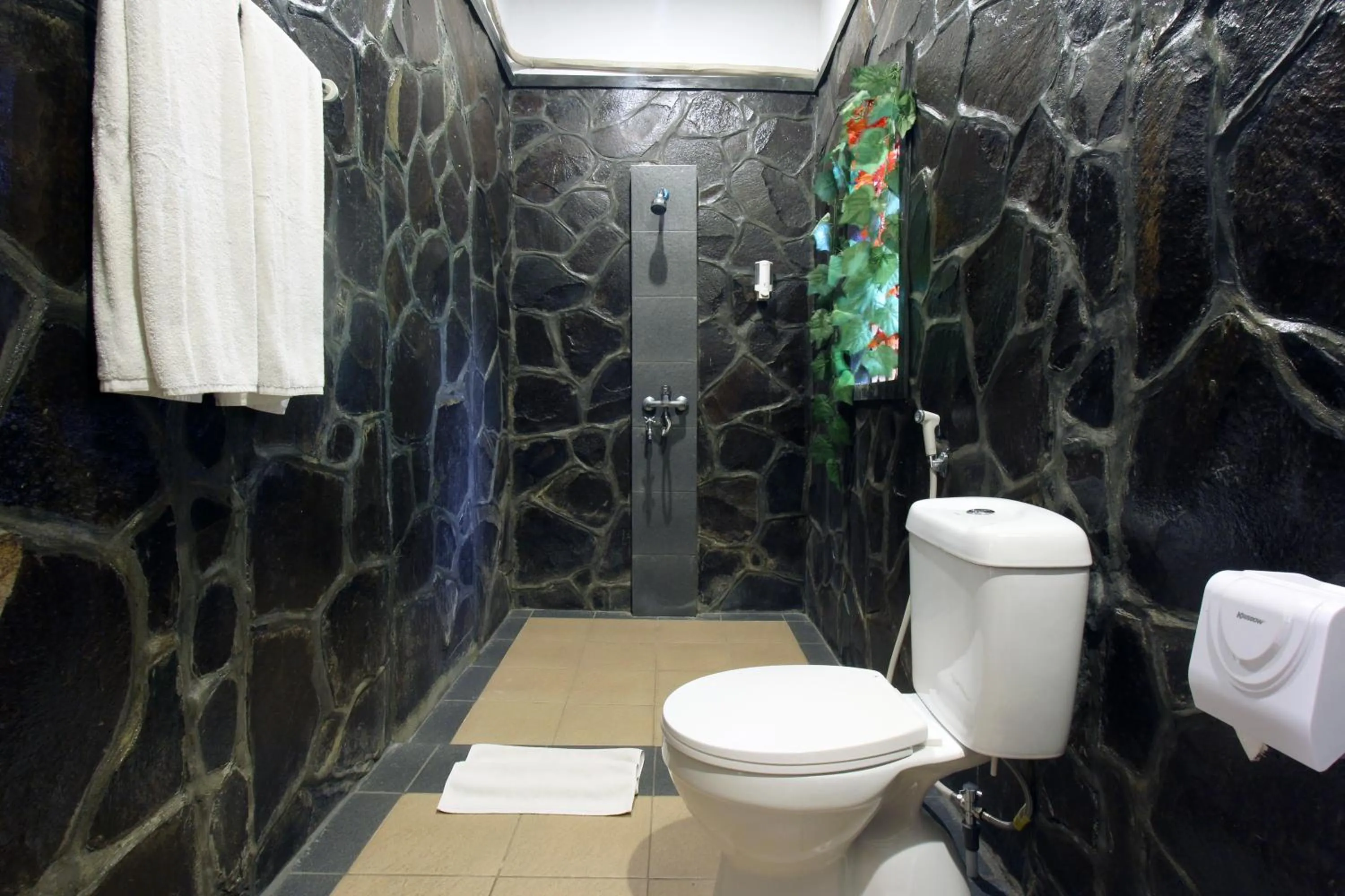 Bathroom in Nara Ubud Cottage by Mahaputra