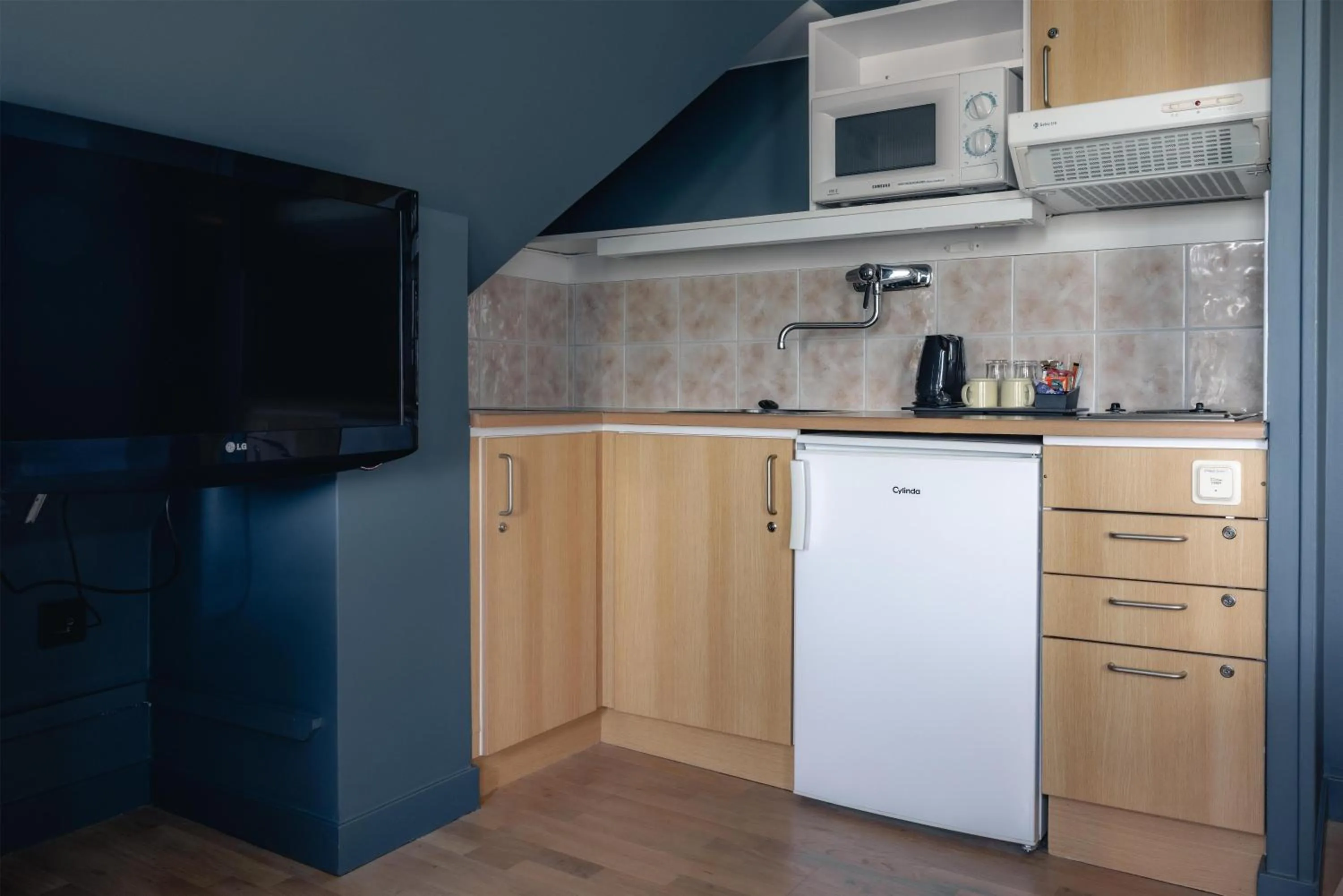 Kitchen or kitchenette in Best Western Solhem Hotel