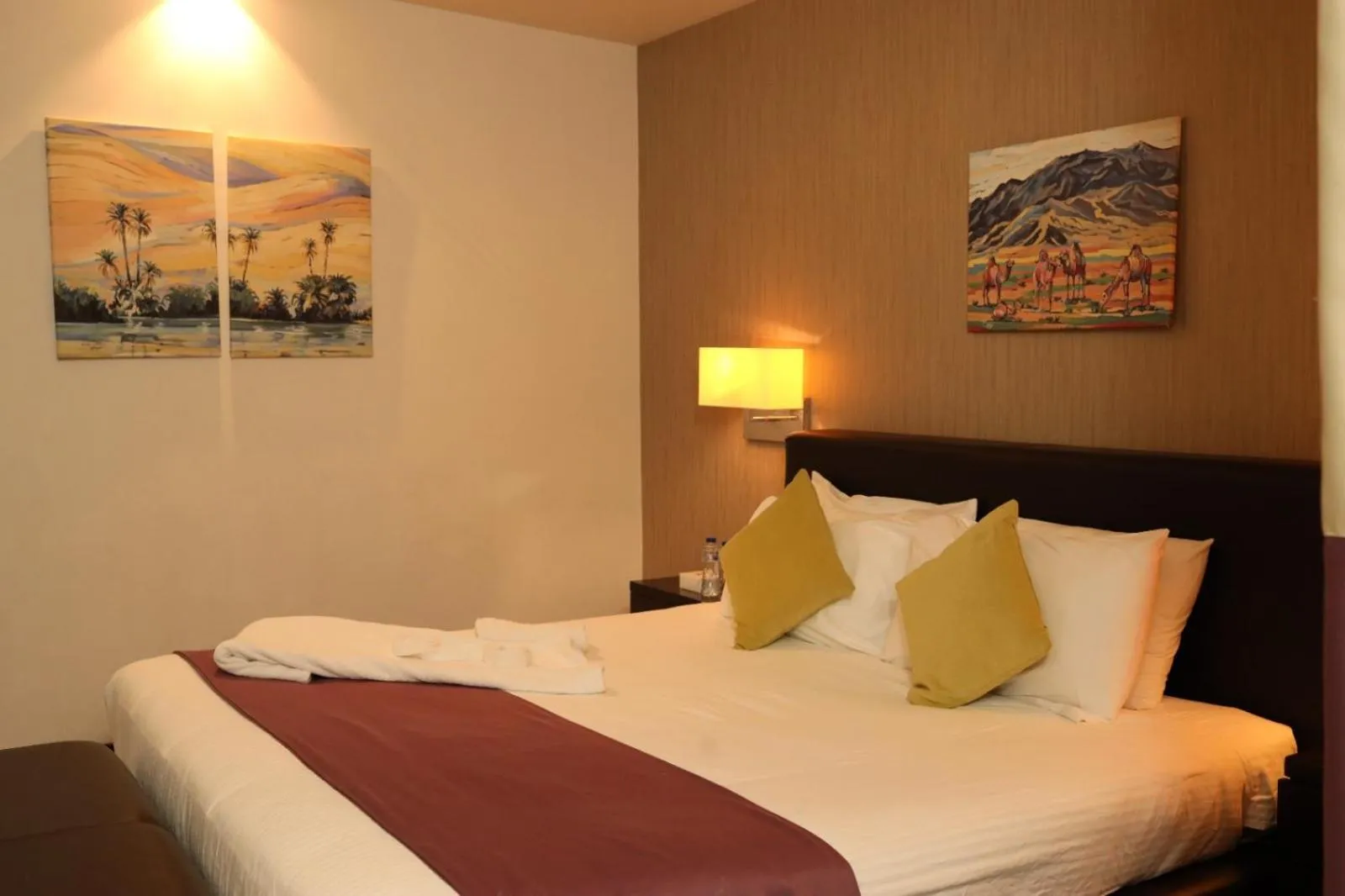 Bed in Golden Tulip Hail