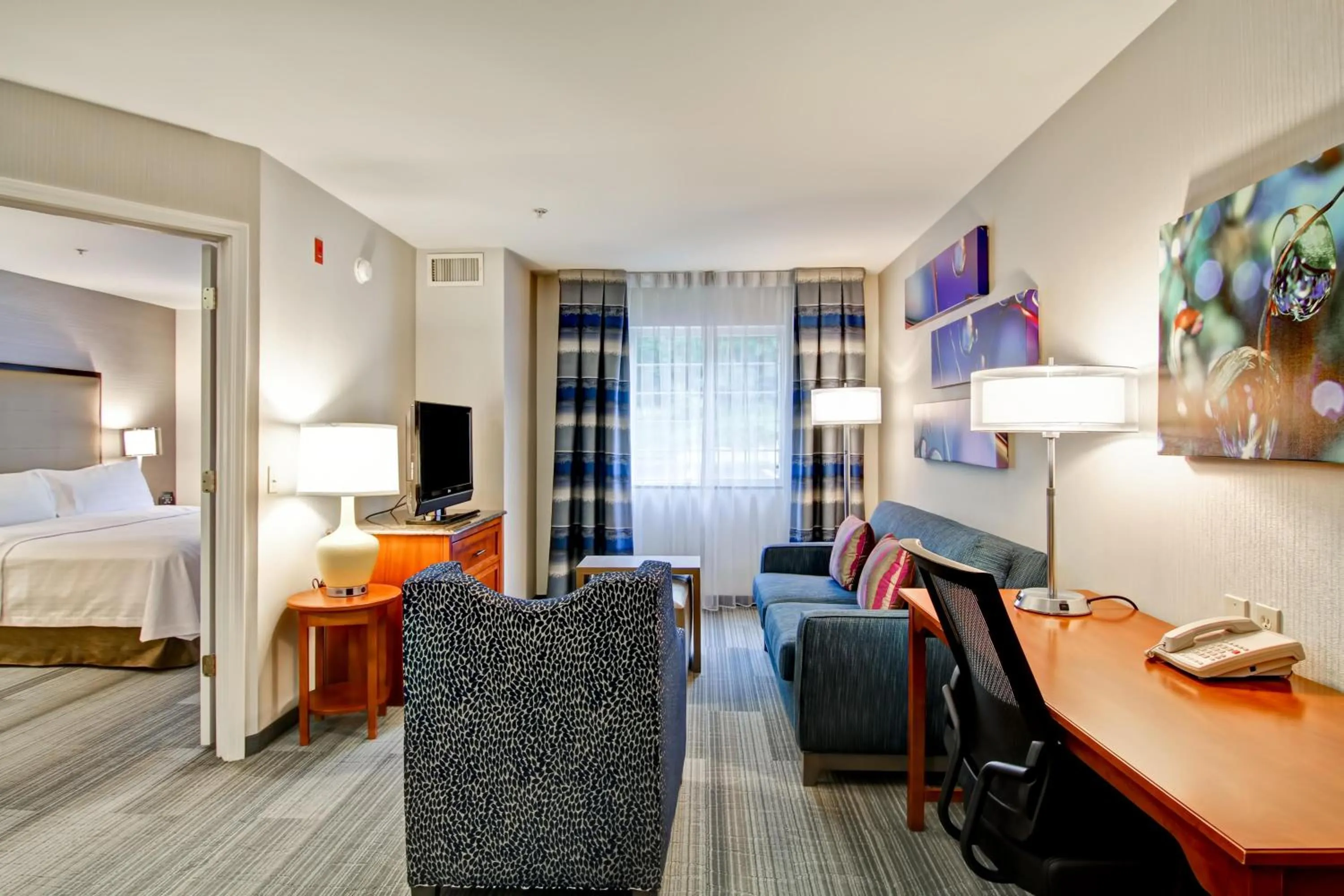 Living room, Bed in Homewood Suites by Hilton Stratford