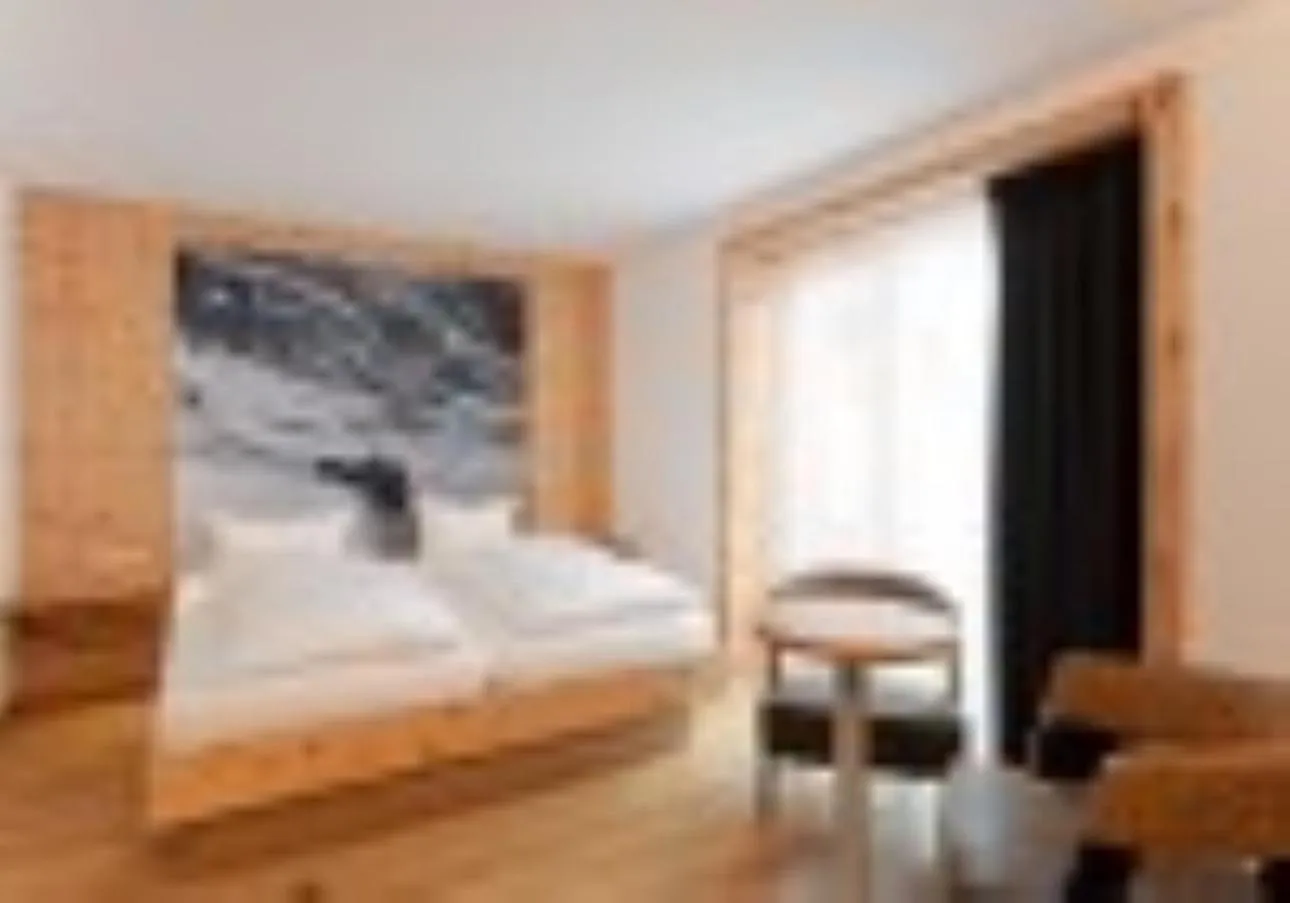 Bed in Mondschein Hotel & Chalet Ski-In Ski-Out Luxus am Arlberg