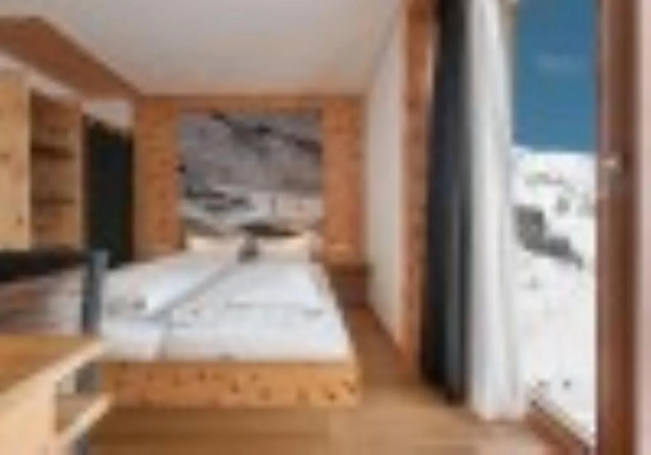 Bedroom, Bed in Mondschein Hotel & Chalet Ski-In Ski-Out Luxus am Arlberg
