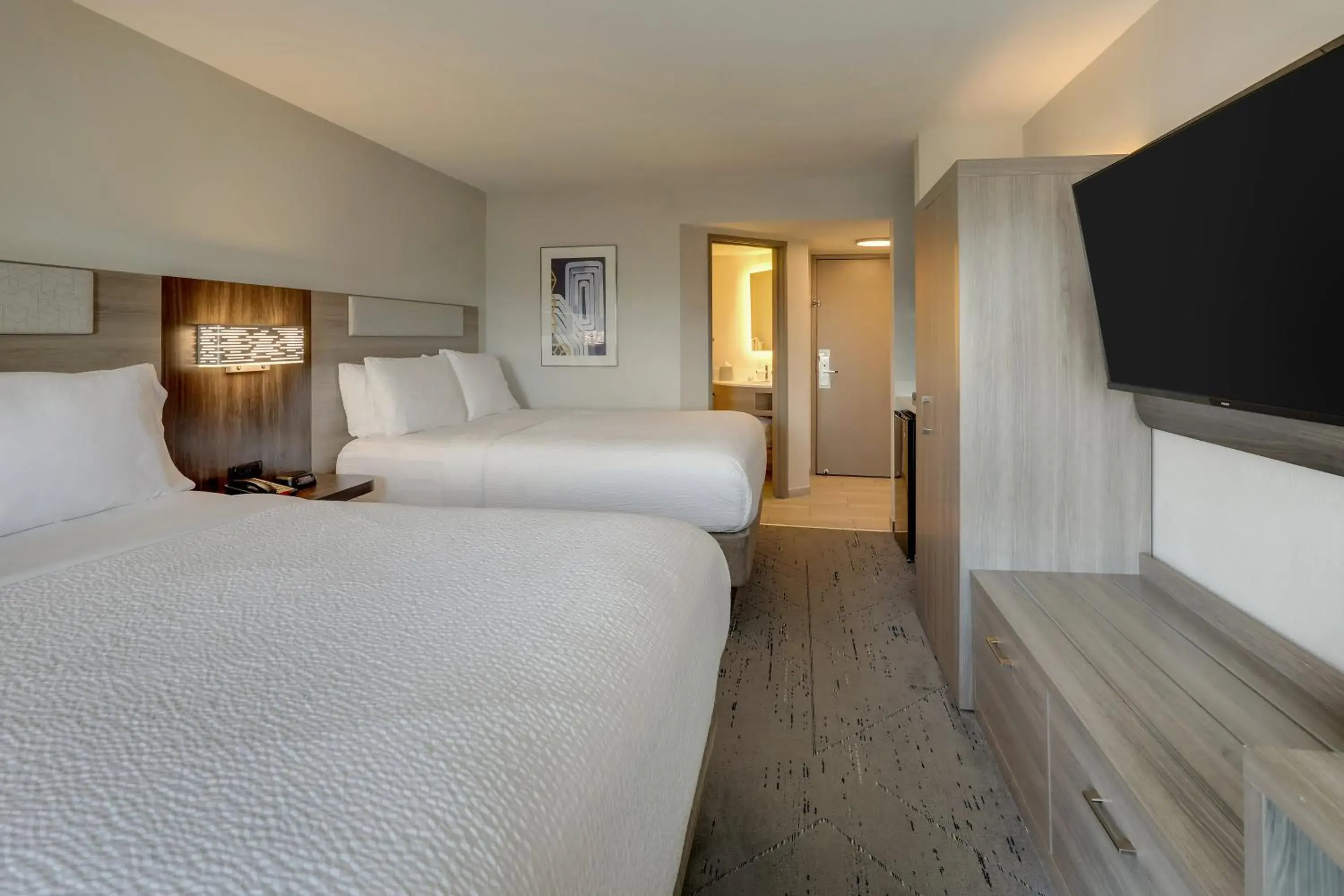 Standard Queen Room with Two Queen Beds and Balcony - Poolside View in Holiday Inn Express Hotel & Suites Branson 76 Central by IHG Standard Queen Room with Two Queen Beds and Balcony - Poolside View in Holiday Inn Express Hotel & Suites Branson 76 Central by IHG