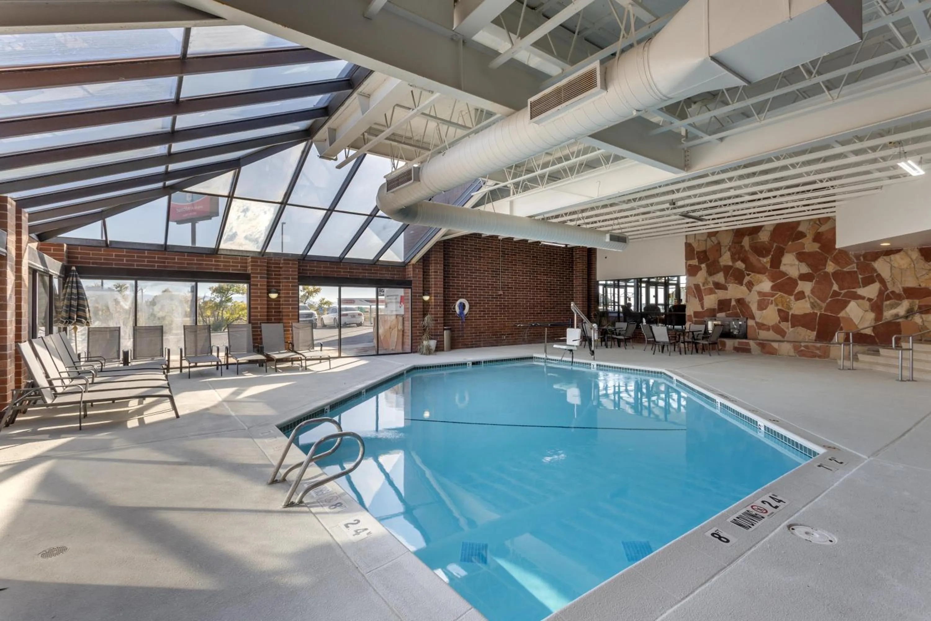 Pool view in SureStay Plus Hotel by Best Western Price