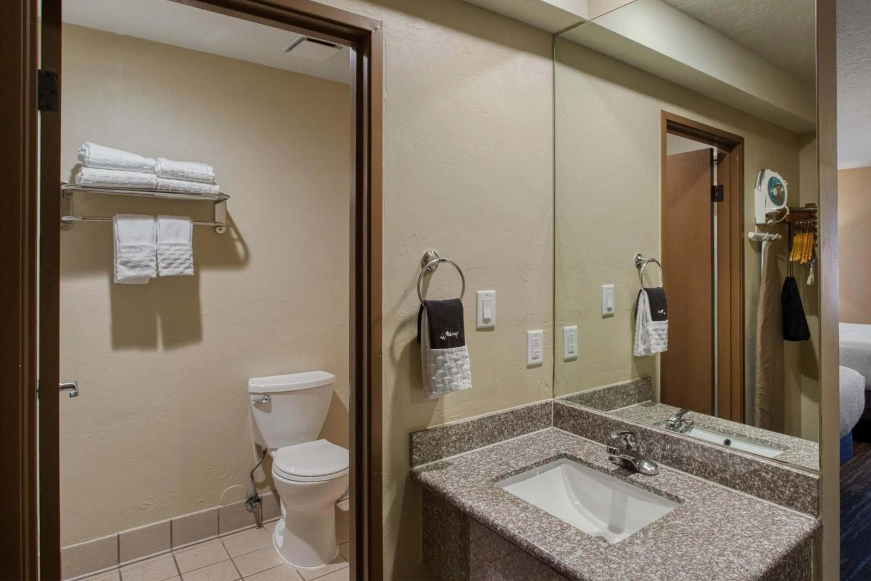 Bathroom in SureStay Plus Hotel by Best Western Price