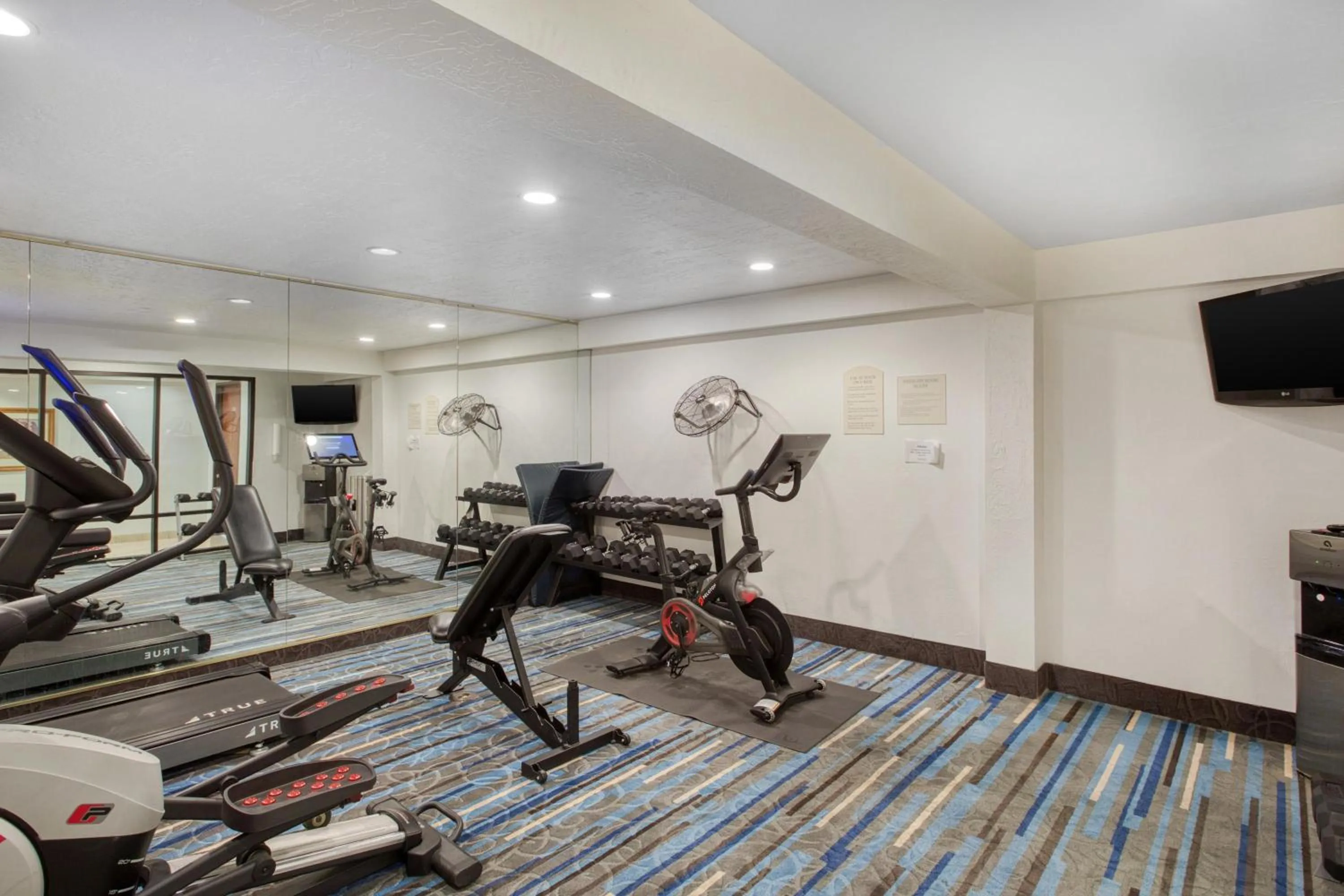 Fitness centre/facilities in SureStay Plus Hotel by Best Western Price
