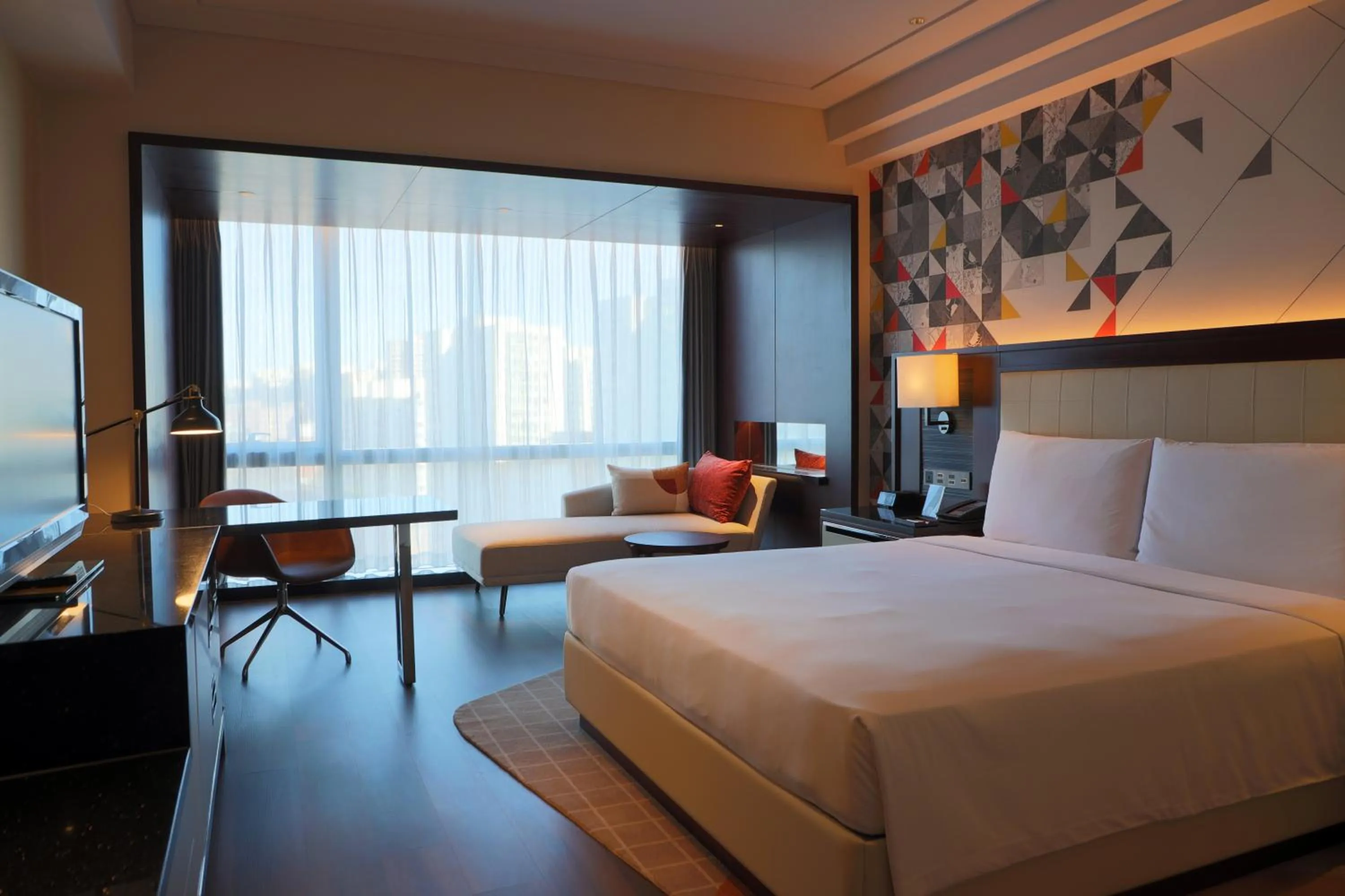 Bed in Renaissance Beijing Capital Hotel