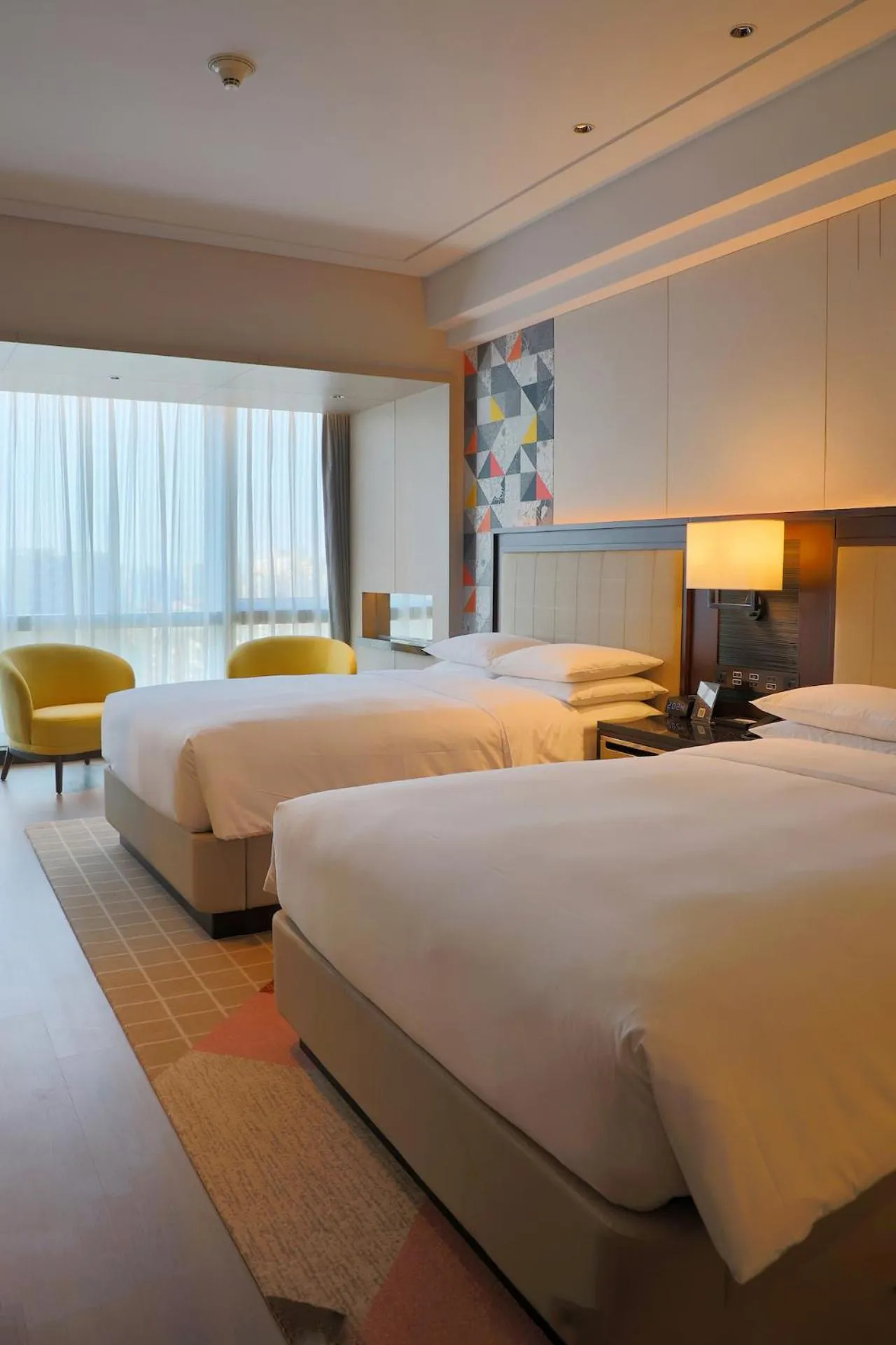 Bed in Renaissance Beijing Capital Hotel