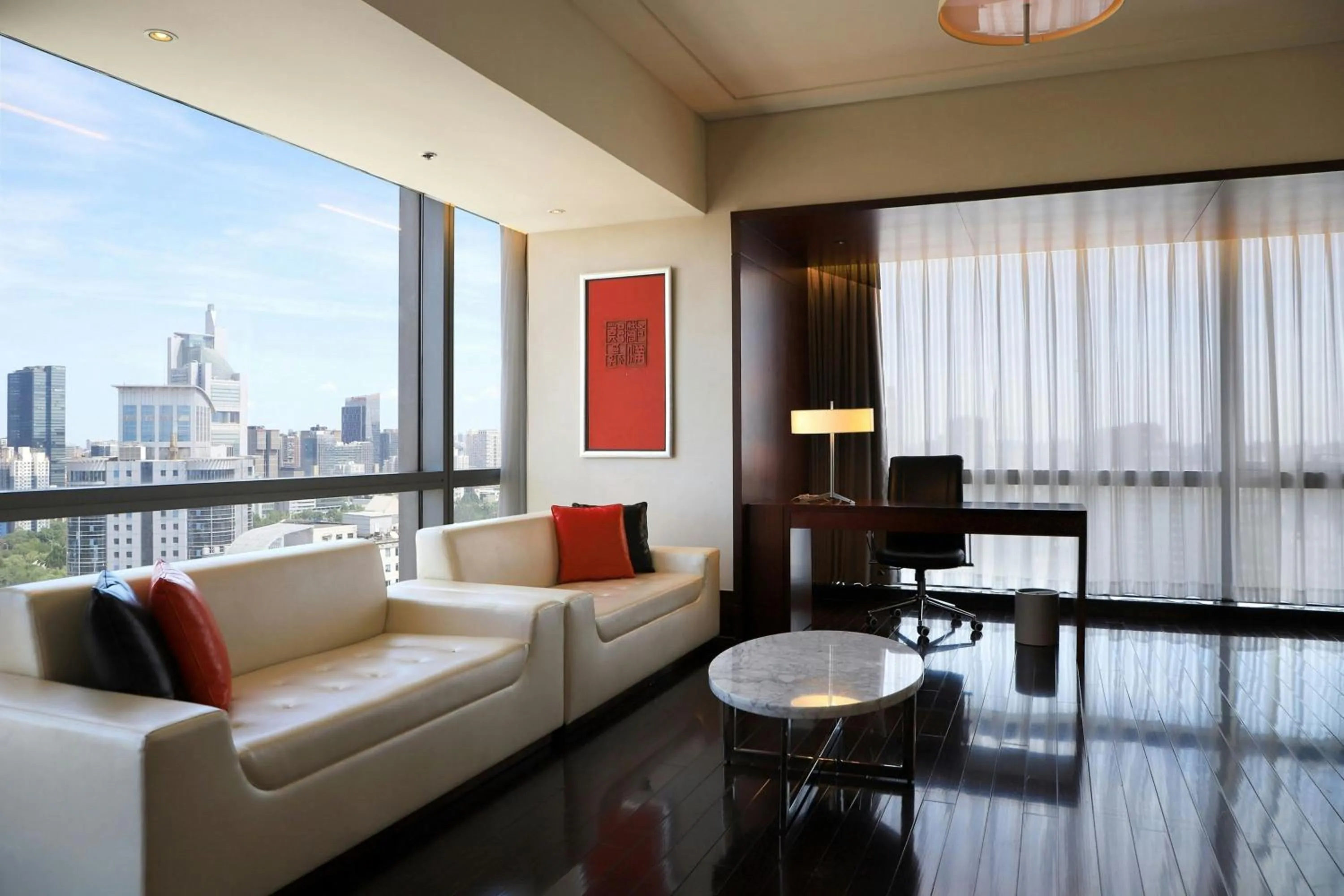 Living room, Bed in Renaissance Beijing Capital Hotel