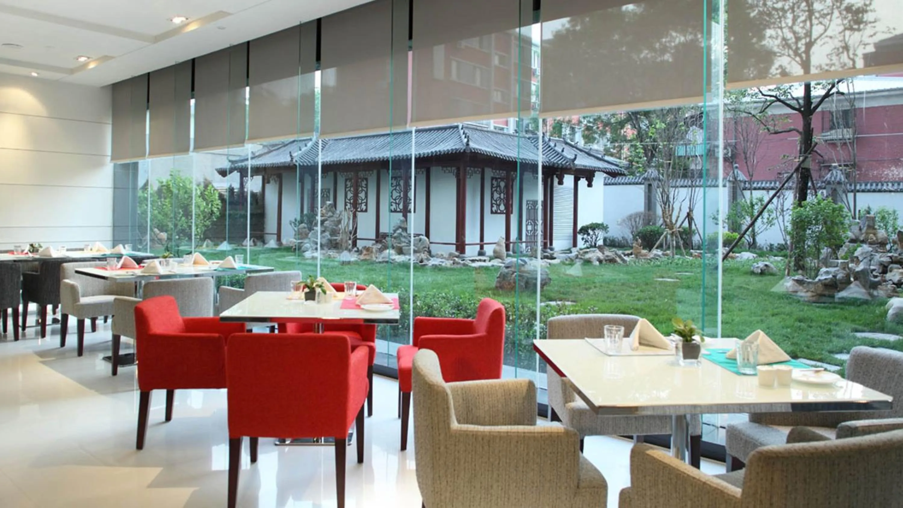 Property building in Holiday Inn Beijing Deshengmen by IHG on 2nd Ring Road Extension 10-15 minute taxi ride to Shichahai Lama Temple Drum Tower Close to Beijing North Station for Badaling Great Wall Near Exit B Jishuitan Metro Line 2