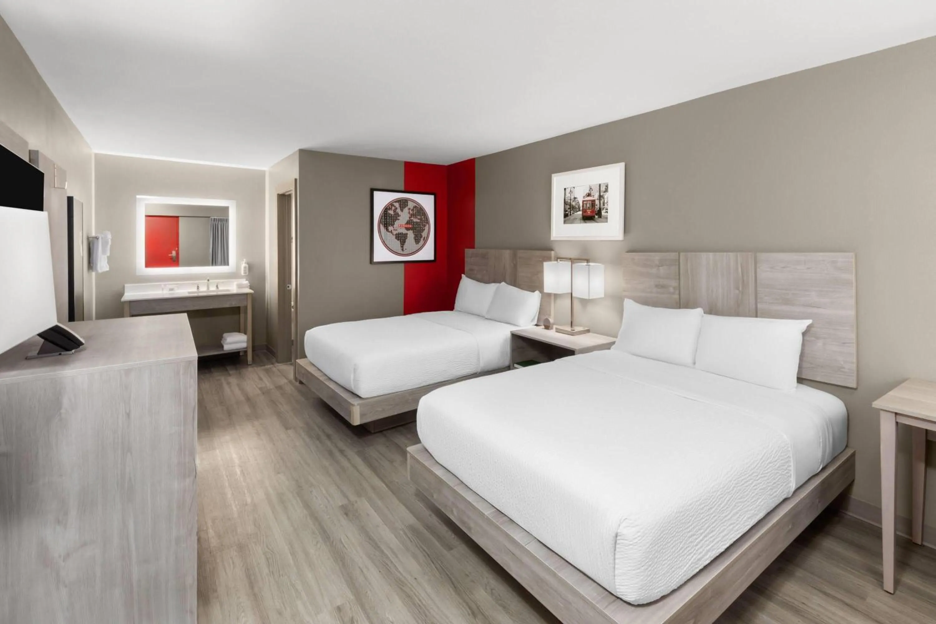 Photo of the whole room, Bed in Ramada by Wyndham Kenner New Orleans Airport South