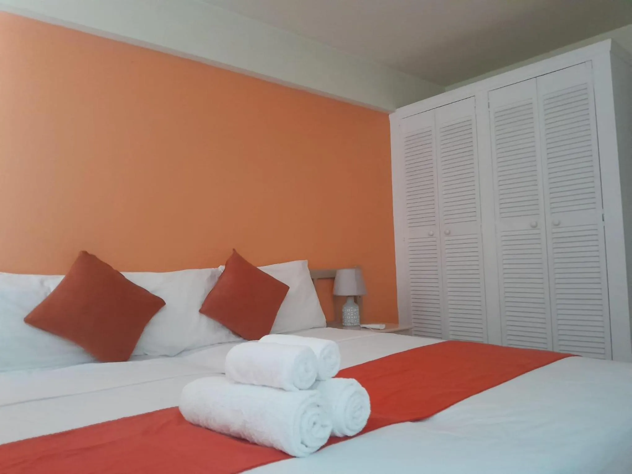 Bed in Melrose Beach Apartments Inc