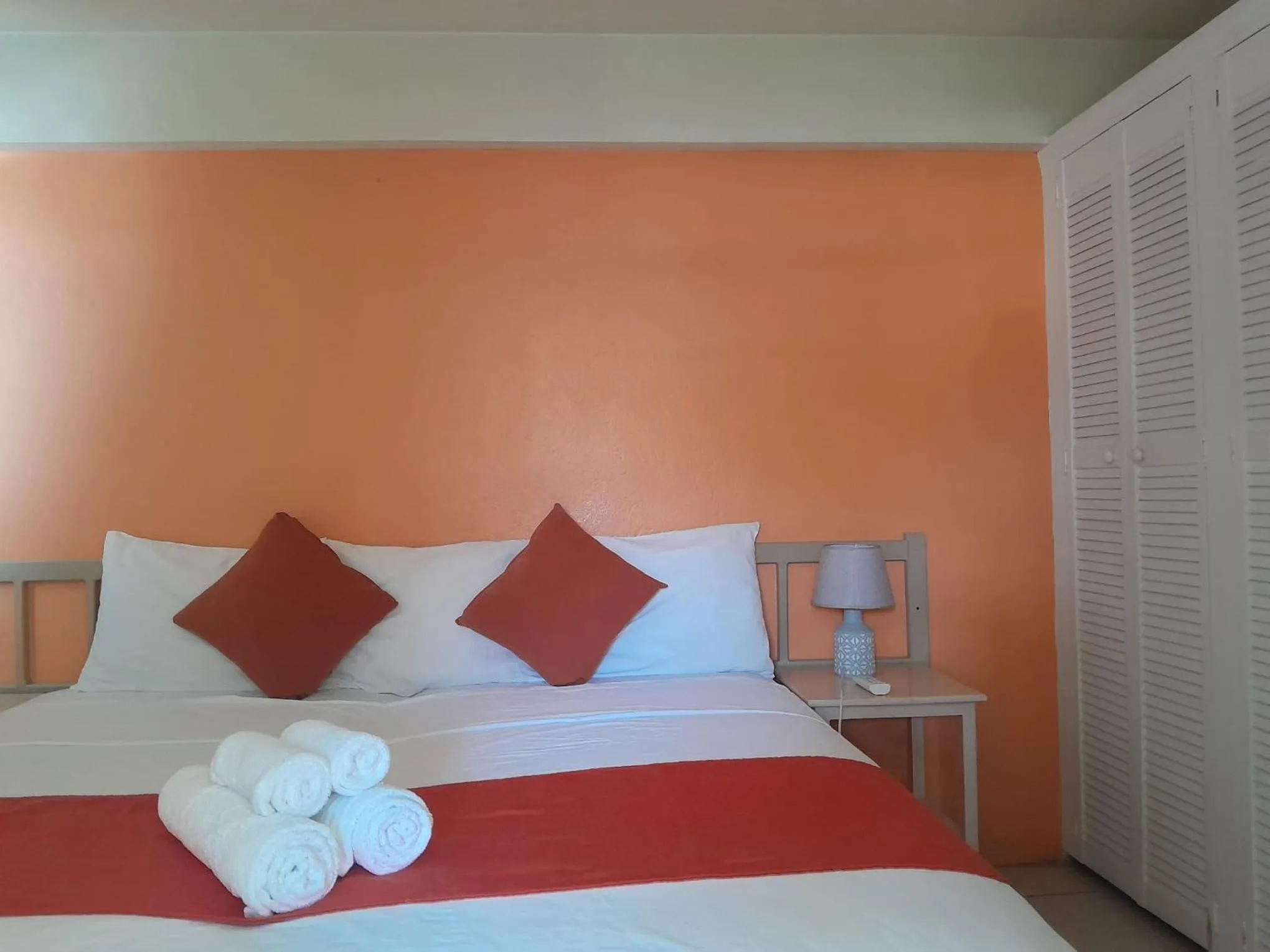 Bed in Melrose Beach Apartments Inc