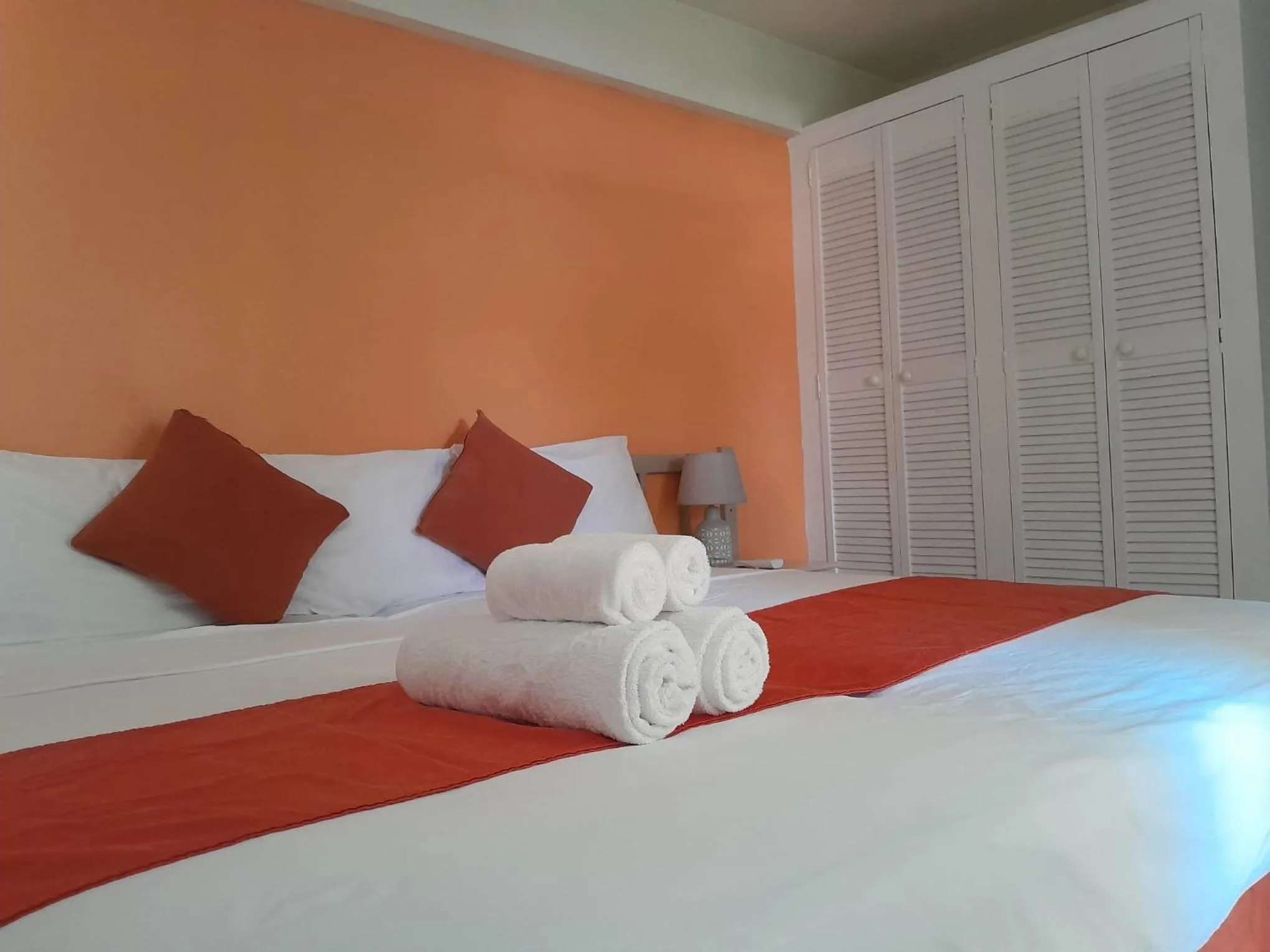 Bed in Melrose Beach Apartments Inc