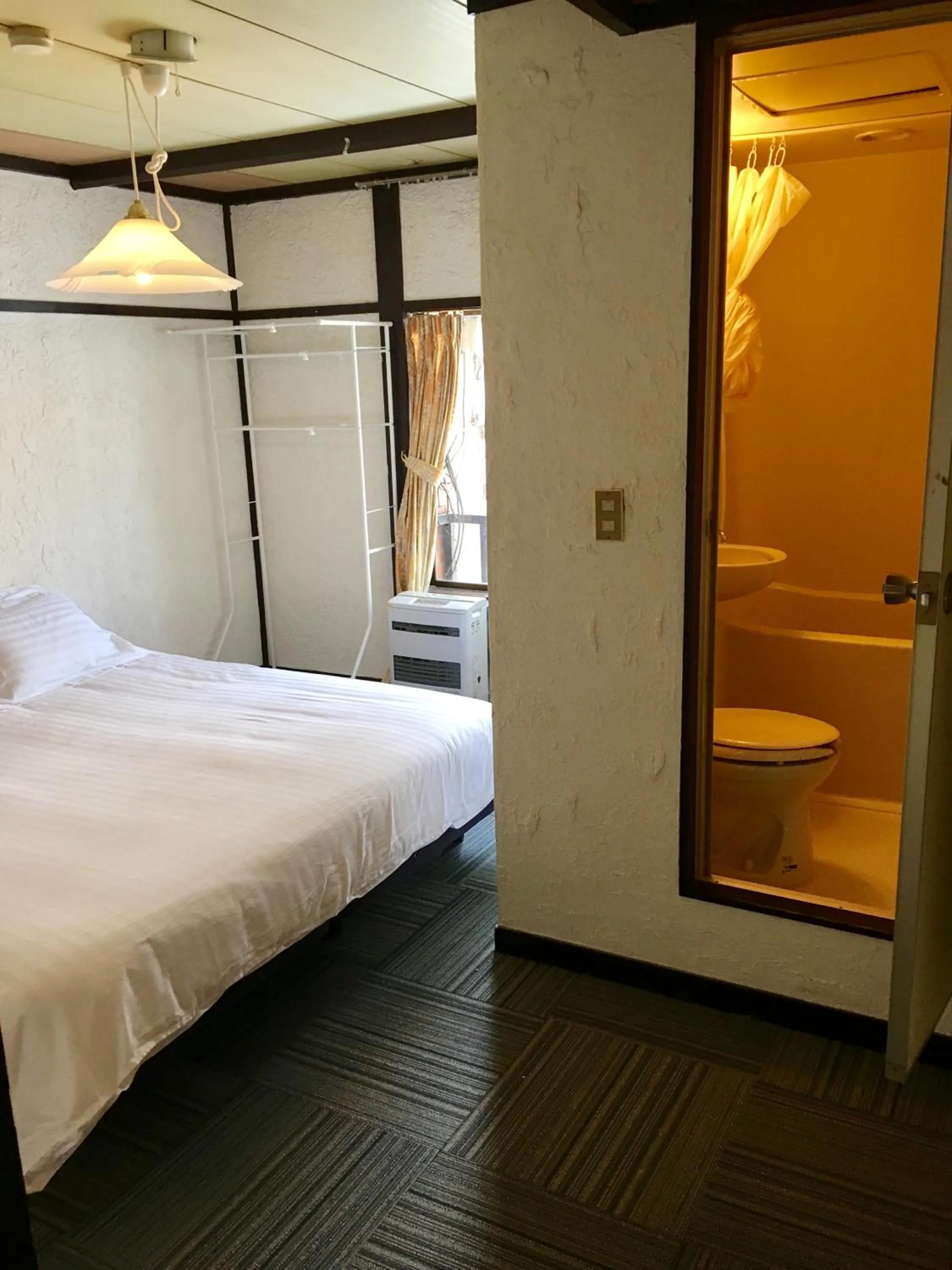 Photo of the whole room, Bed in Powder Temple