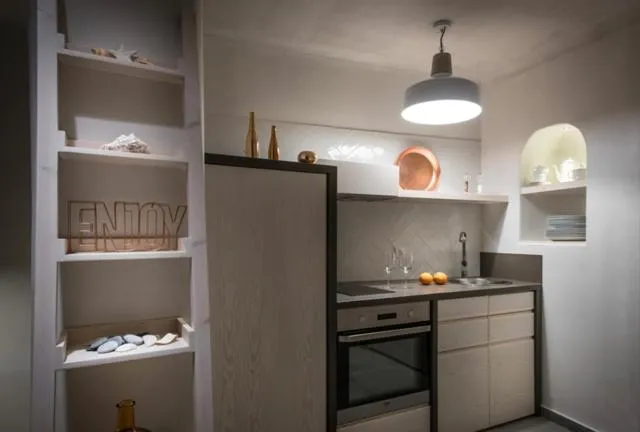Kitchen or kitchenette in Cosmopolis Crete Suites