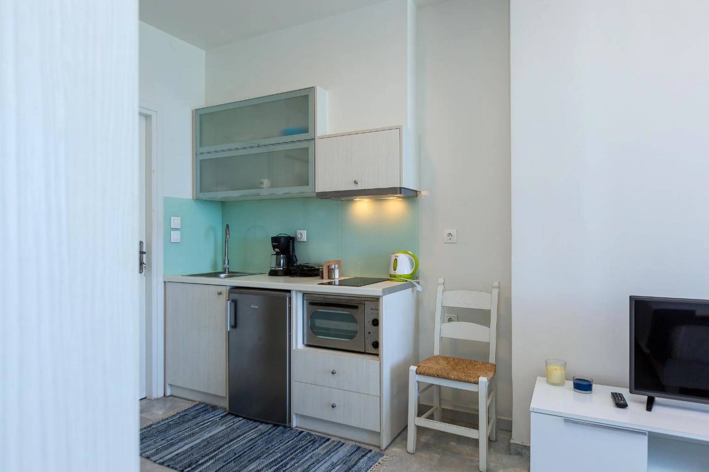 Kitchen or kitchenette in Meltemi Coast Suites