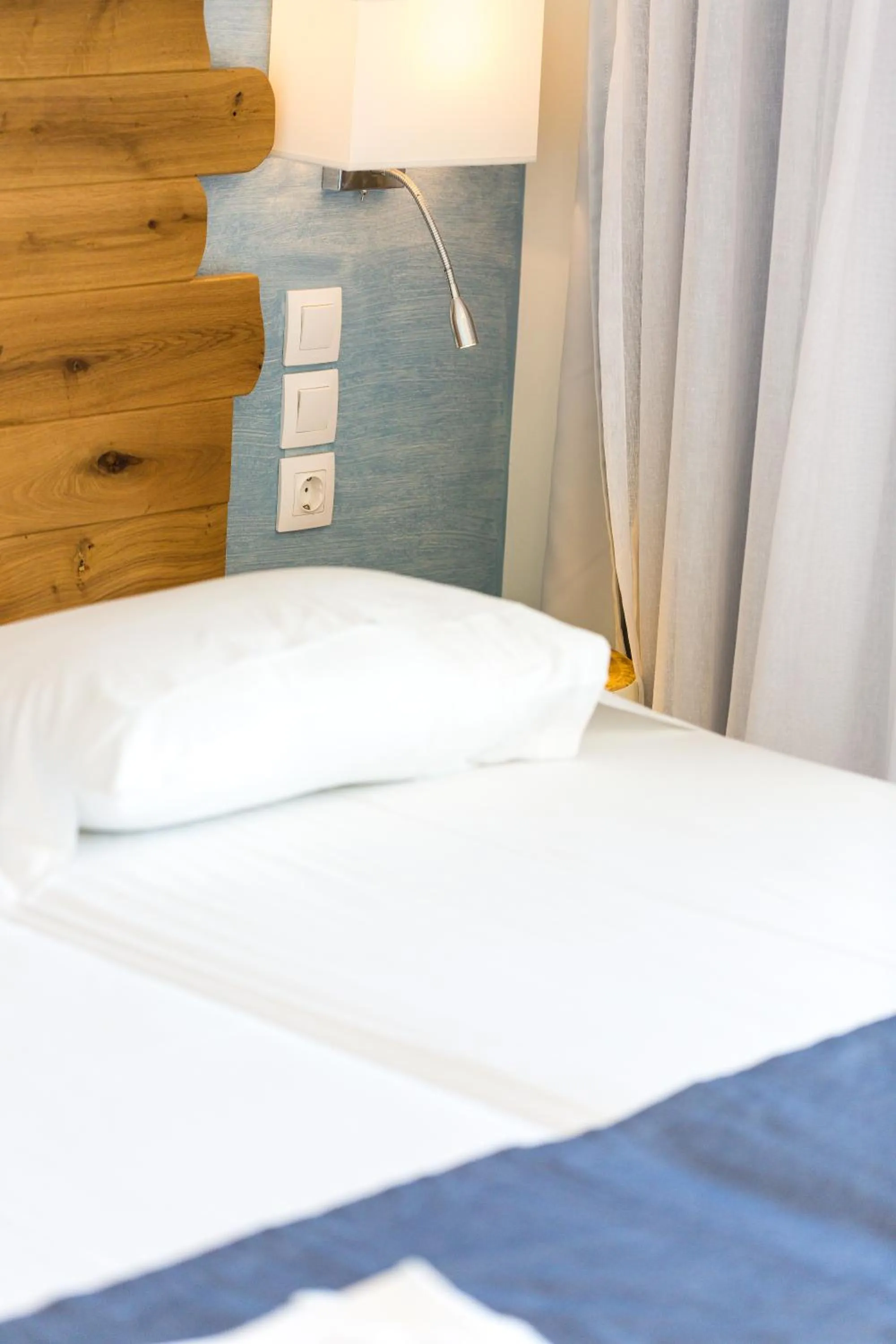 Bed in Meltemi Coast Suites