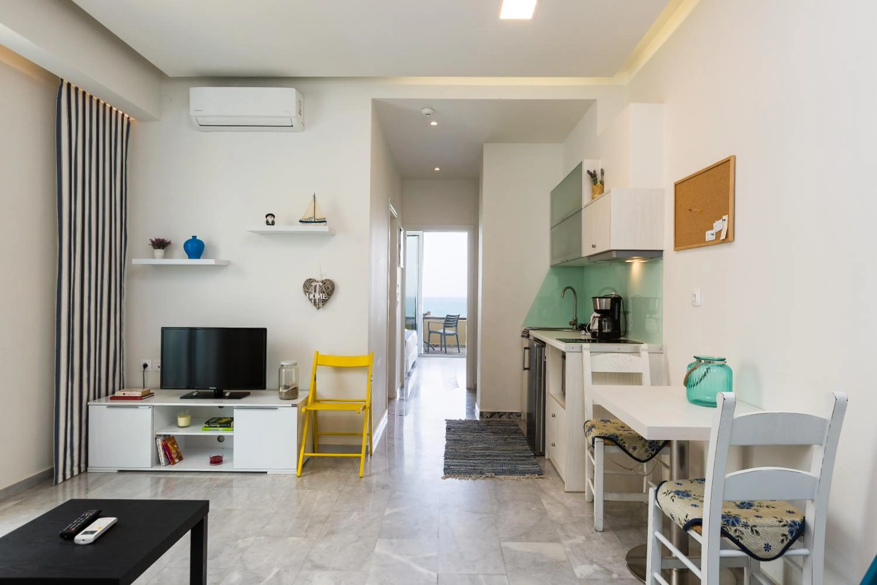 Kitchen or kitchenette in Meltemi Coast Suites