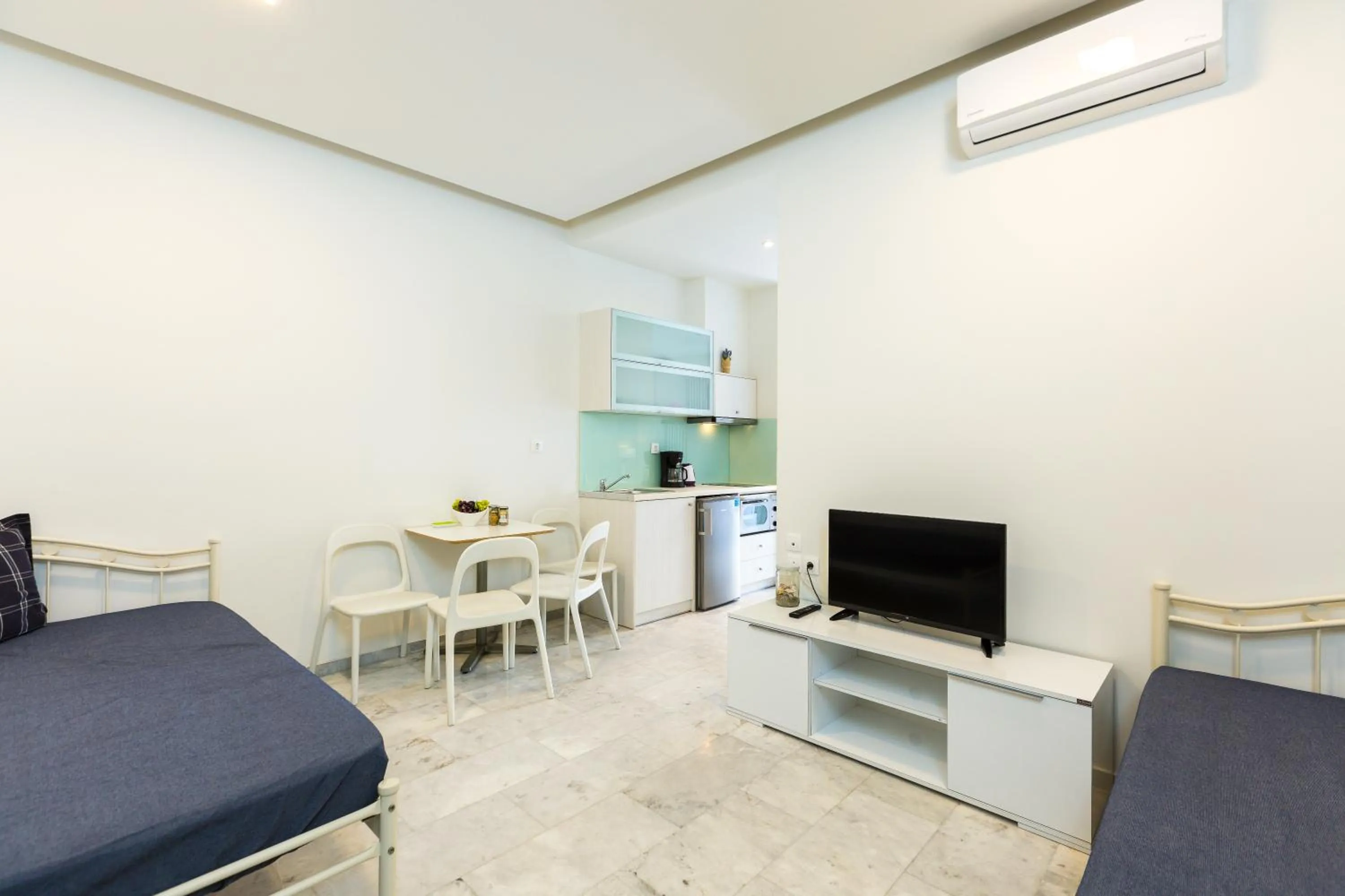 Bed in Meltemi Coast Suites