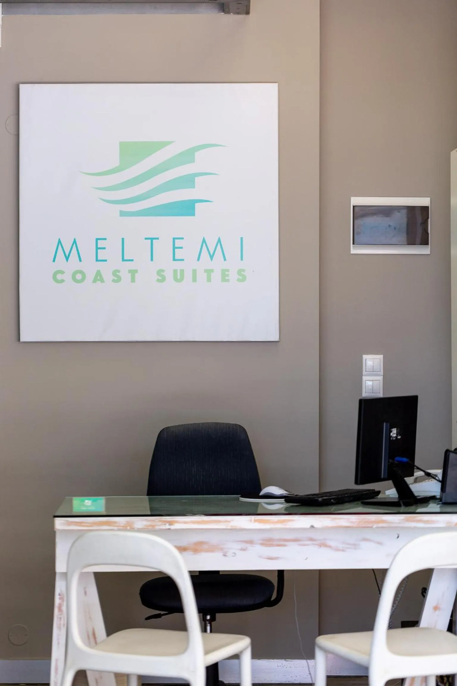 Property logo or sign in Meltemi Coast Suites
