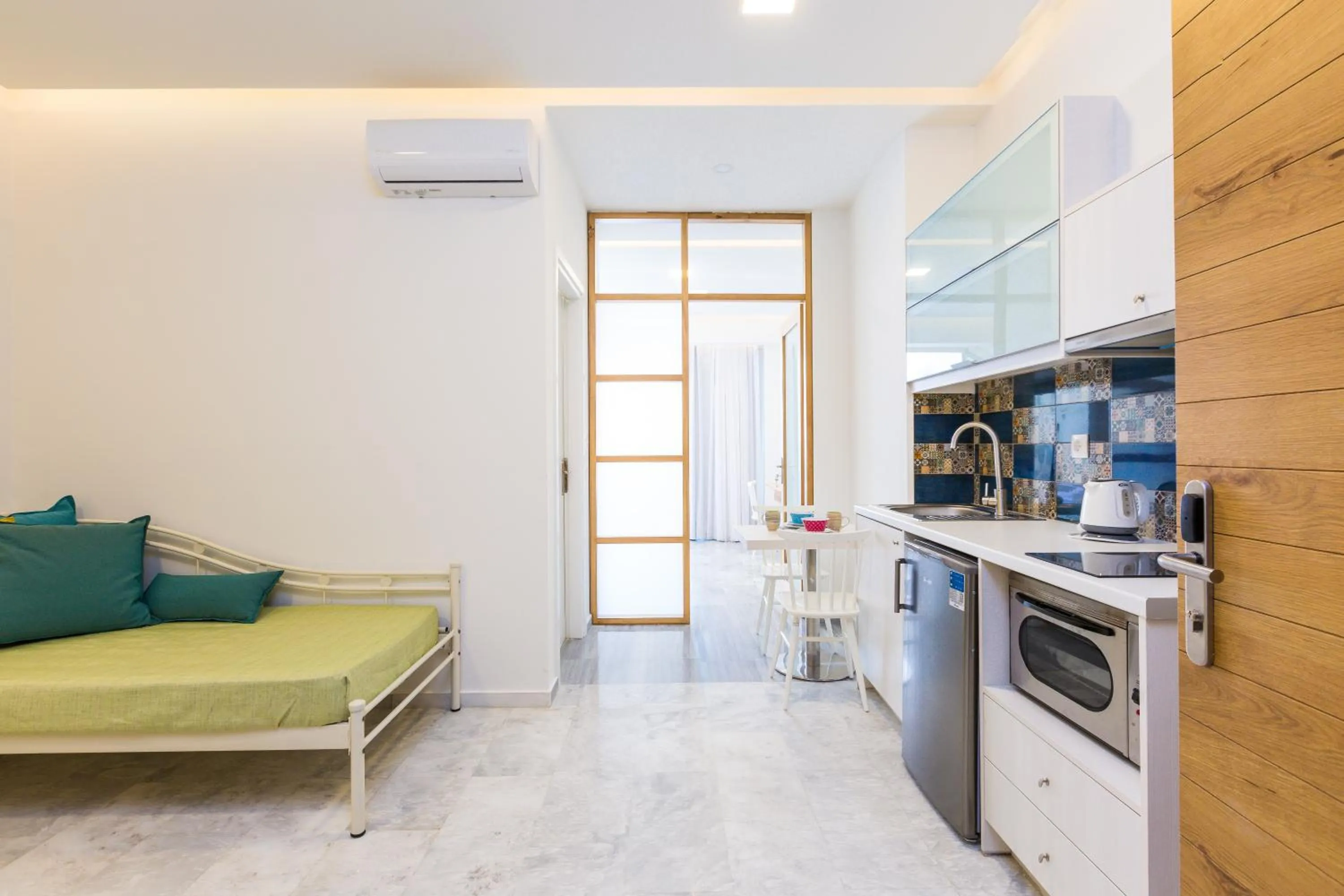 Kitchen or kitchenette in Meltemi Coast Suites