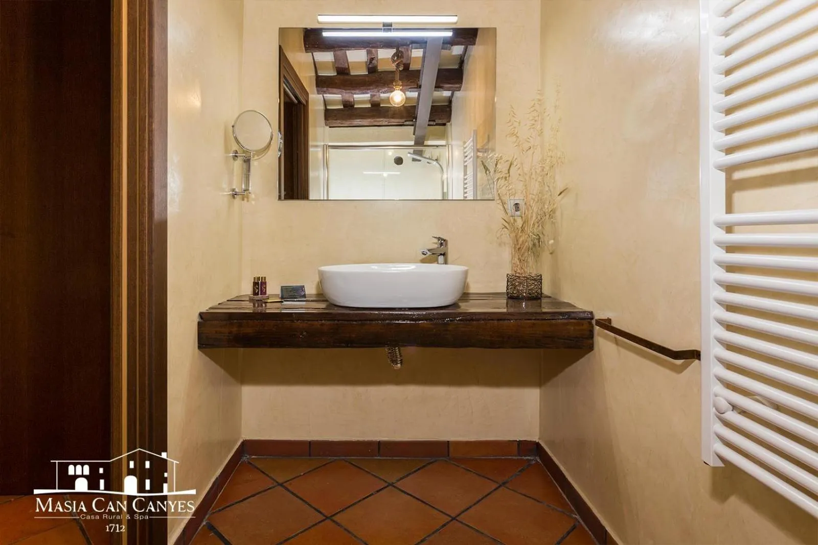 Bathroom in Masia Can Canyes & Spa