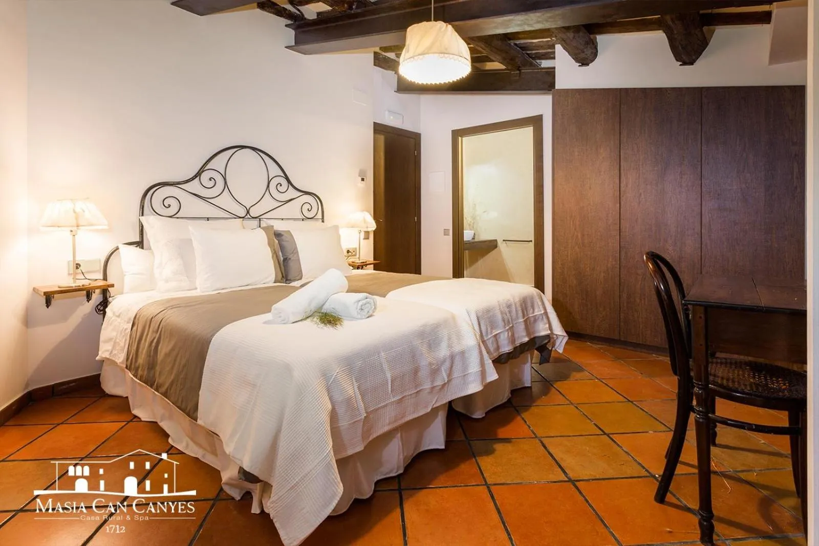 Bed in Masia Can Canyes & Spa