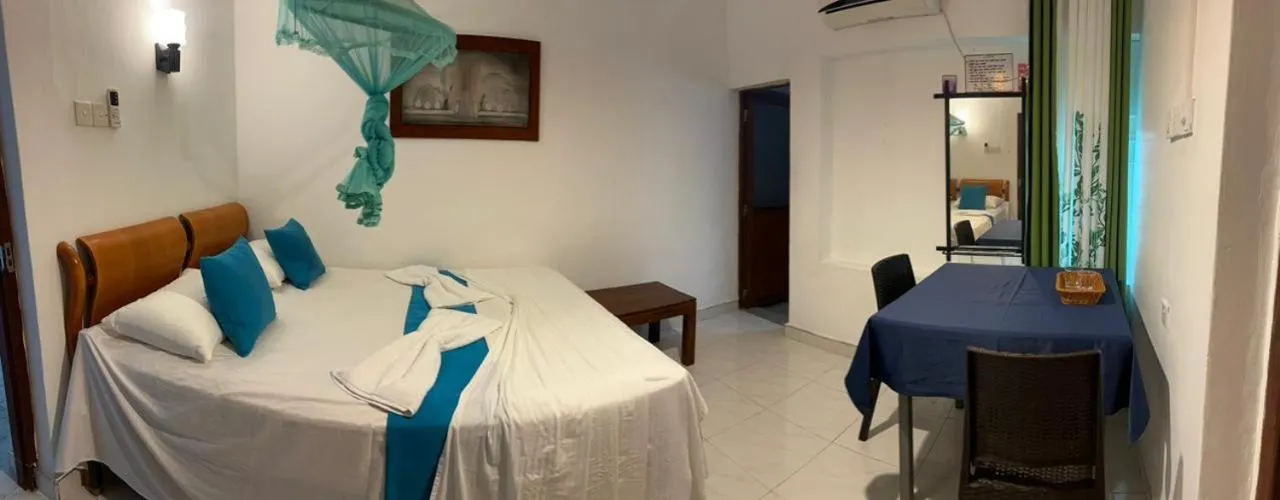 Bed in Goalma Family Holiday Resort & Restaurant