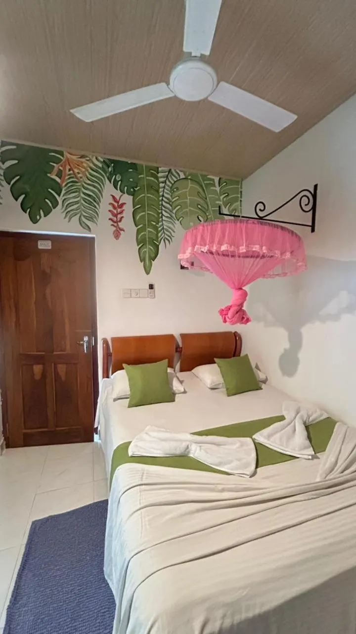 Bed in Goalma Family Holiday Resort & Restaurant