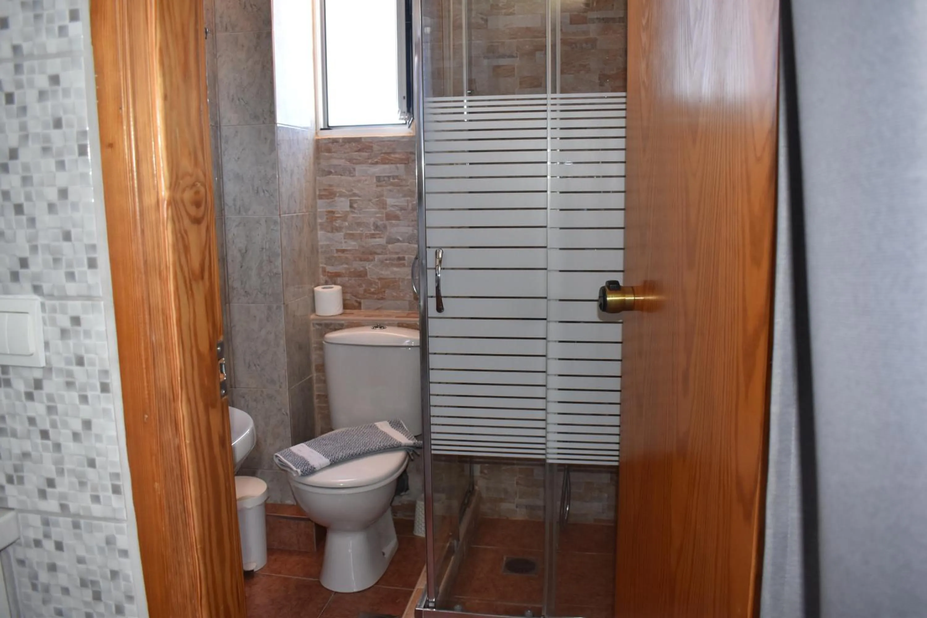 Toilet in Eden Beach Hotel