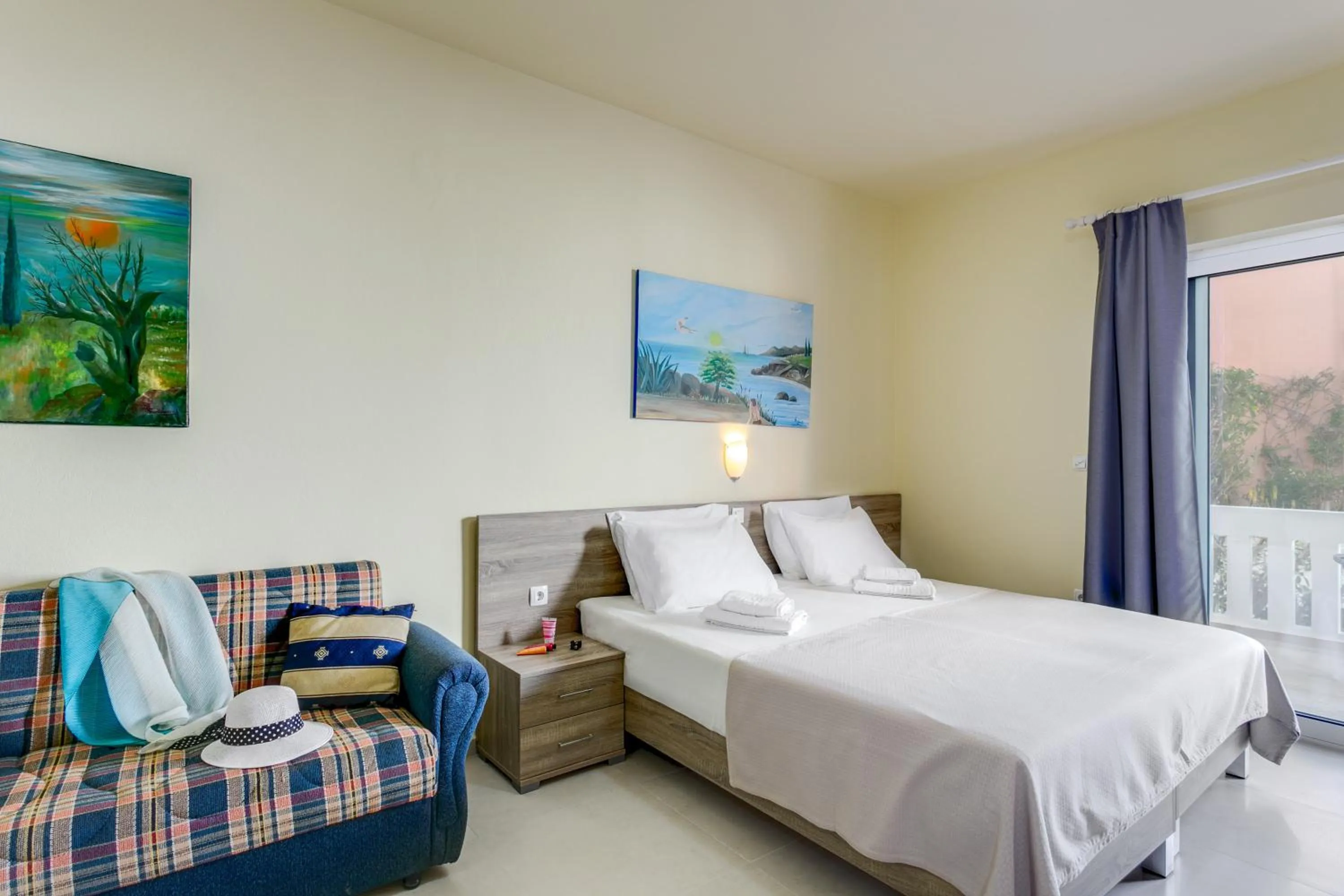 Bed in Eden Beach Hotel