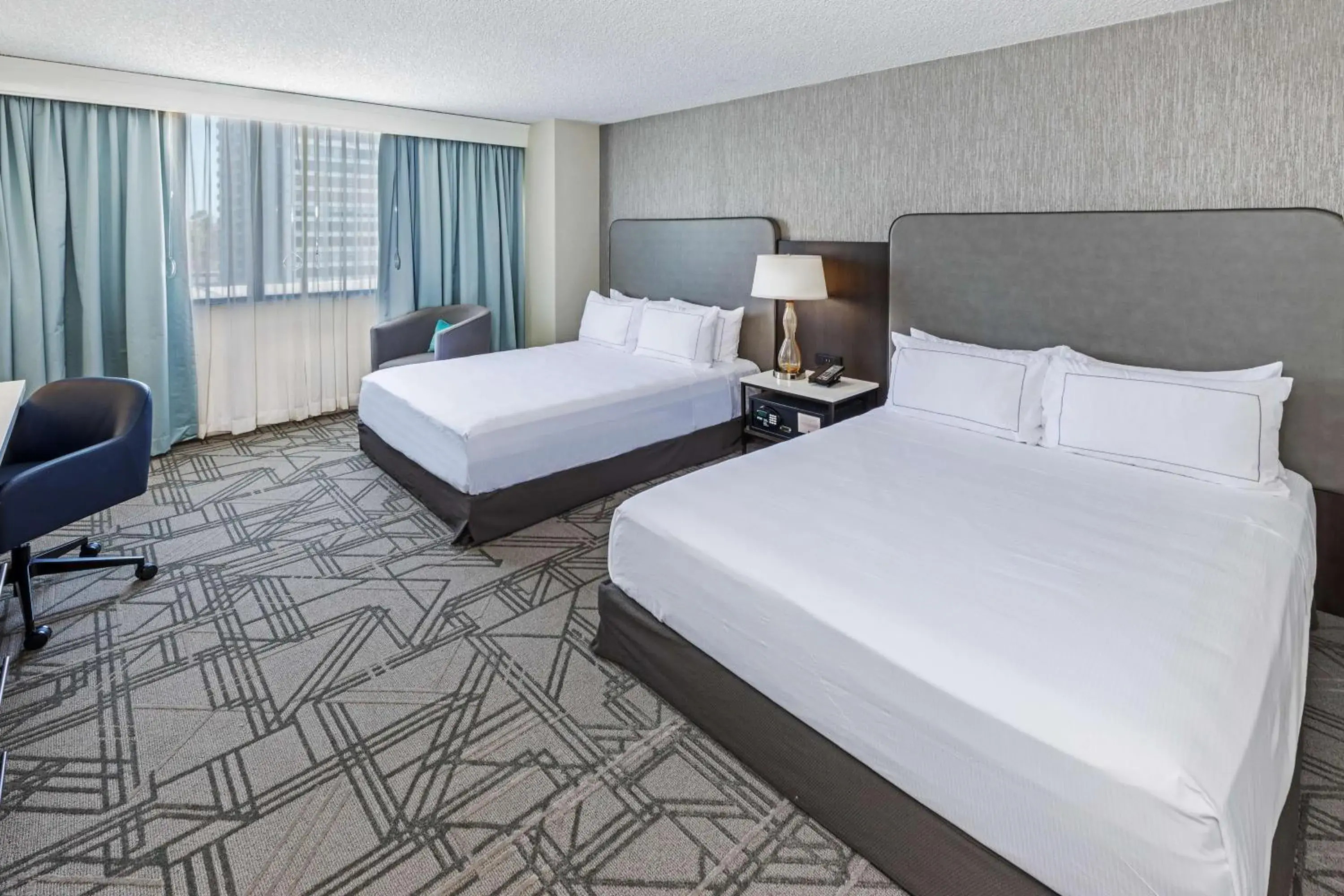 Queen Room with Two Queen Beds and Roll-In Shower - Mobility Accessible in DoubleTree by Hilton Tulsa Downtown Queen Room with Two Queen Beds and Roll-In Shower - Mobility Accessible in DoubleTree by Hilton Tulsa Downtown