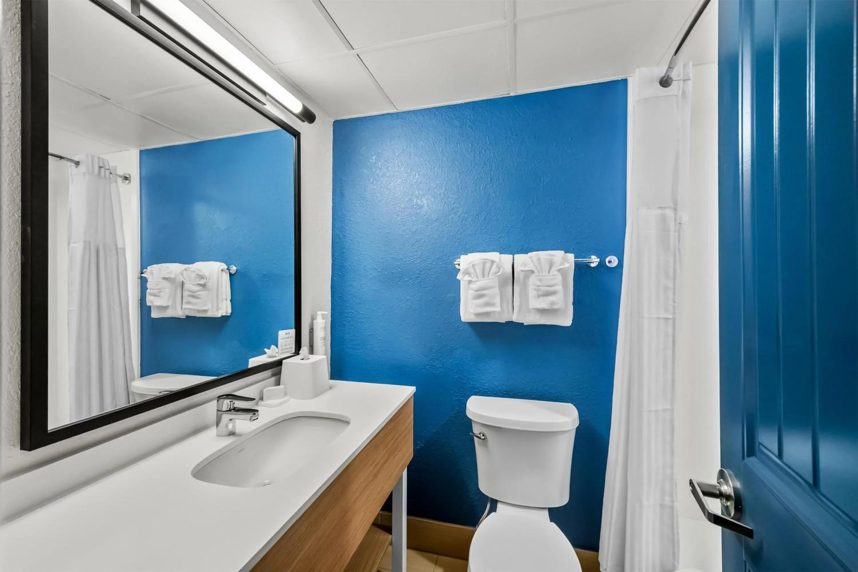 Bathroom in Spark by Hilton Spring Lake Fayetteville