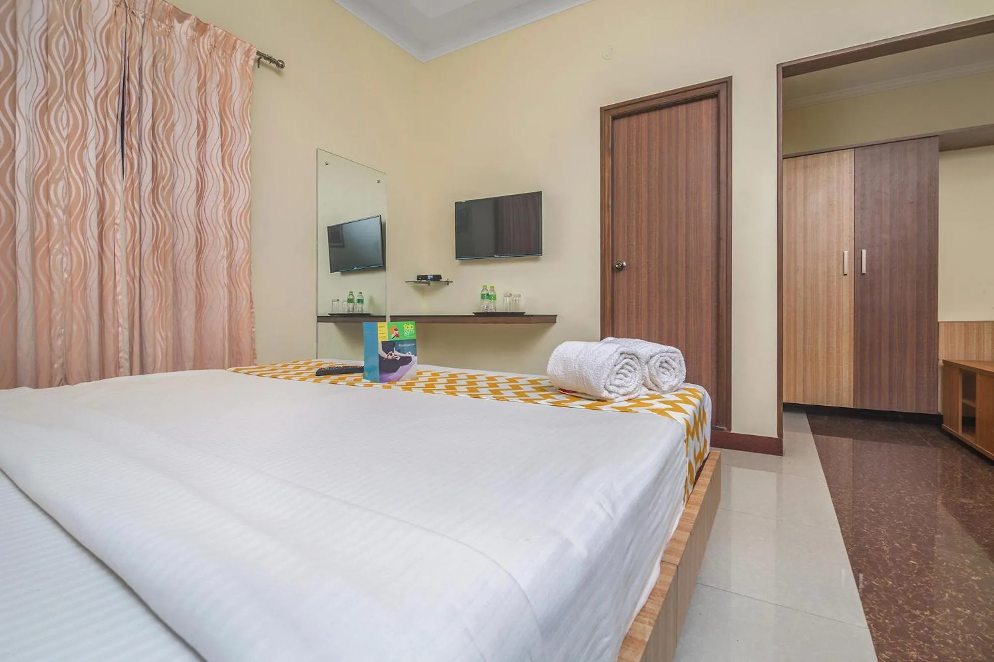 Photo of the whole room, Bed in Hotel Sree Devi Madurai