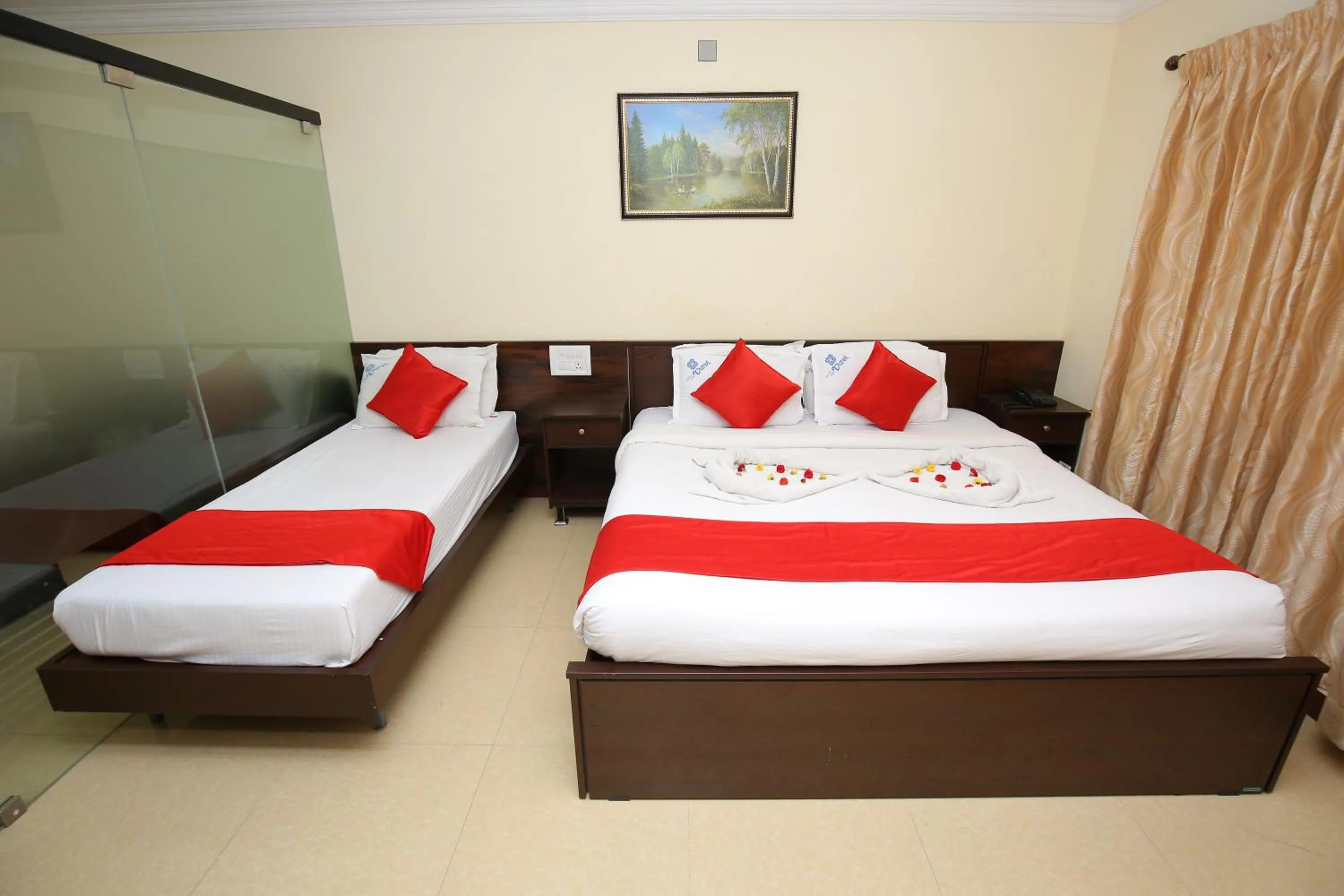 towels, Bed in Hotel Sree Devi Madurai