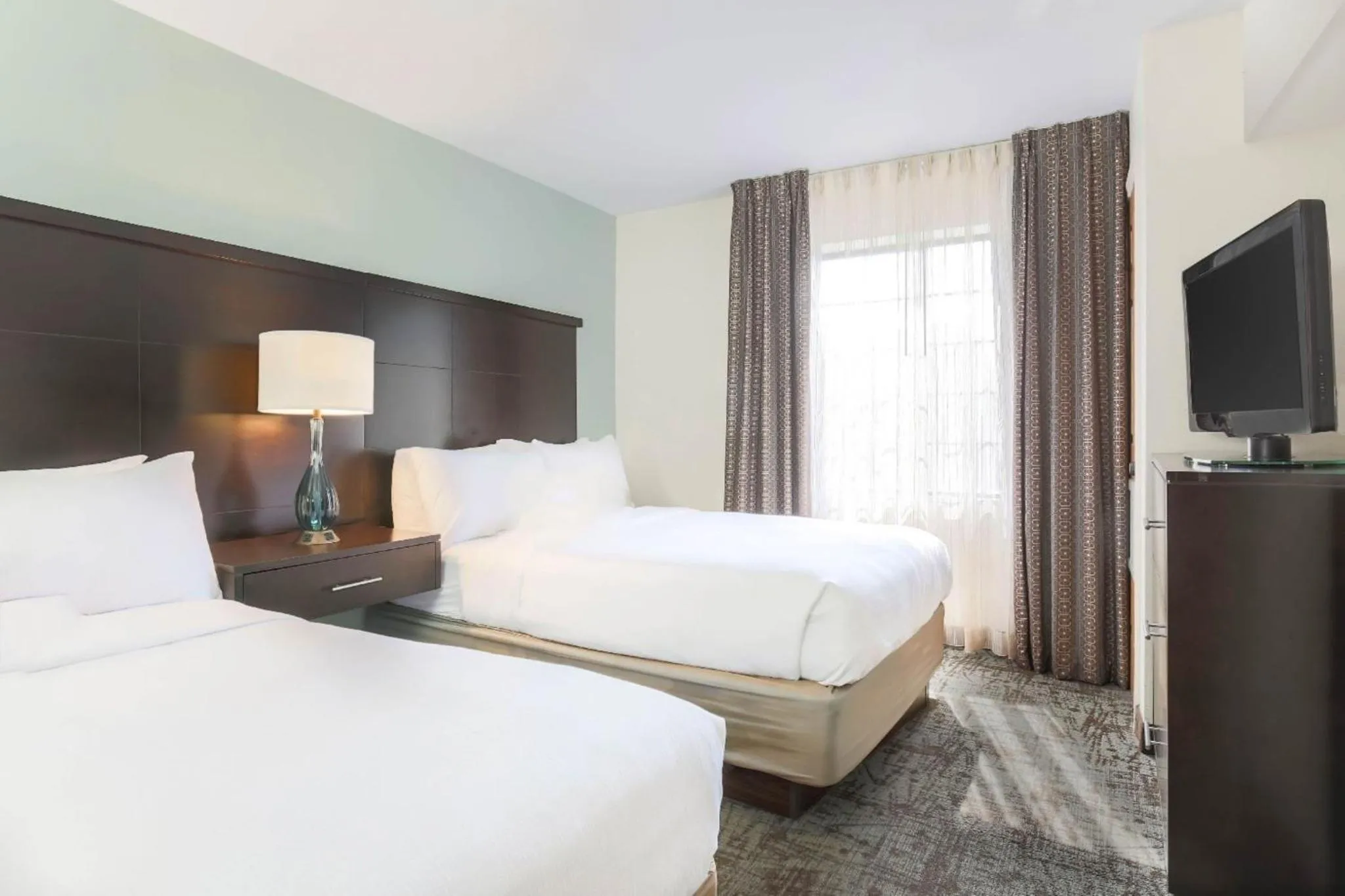 Photo of the whole room, Bed in Staybridge Suites Columbus-Dublin by IHG