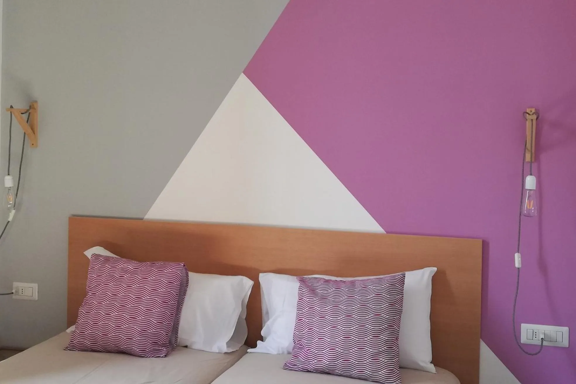 Bed in Hotel Elandra