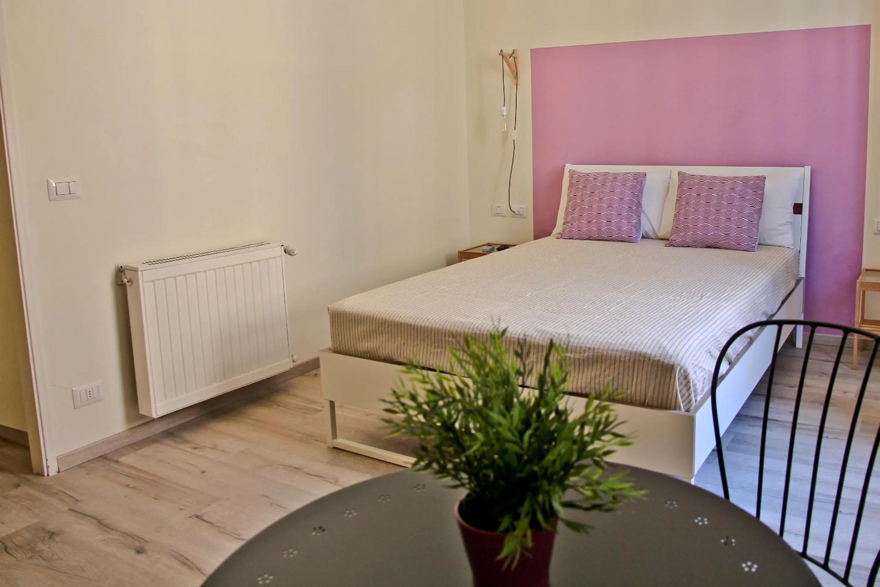 Bed in Hotel Elandra