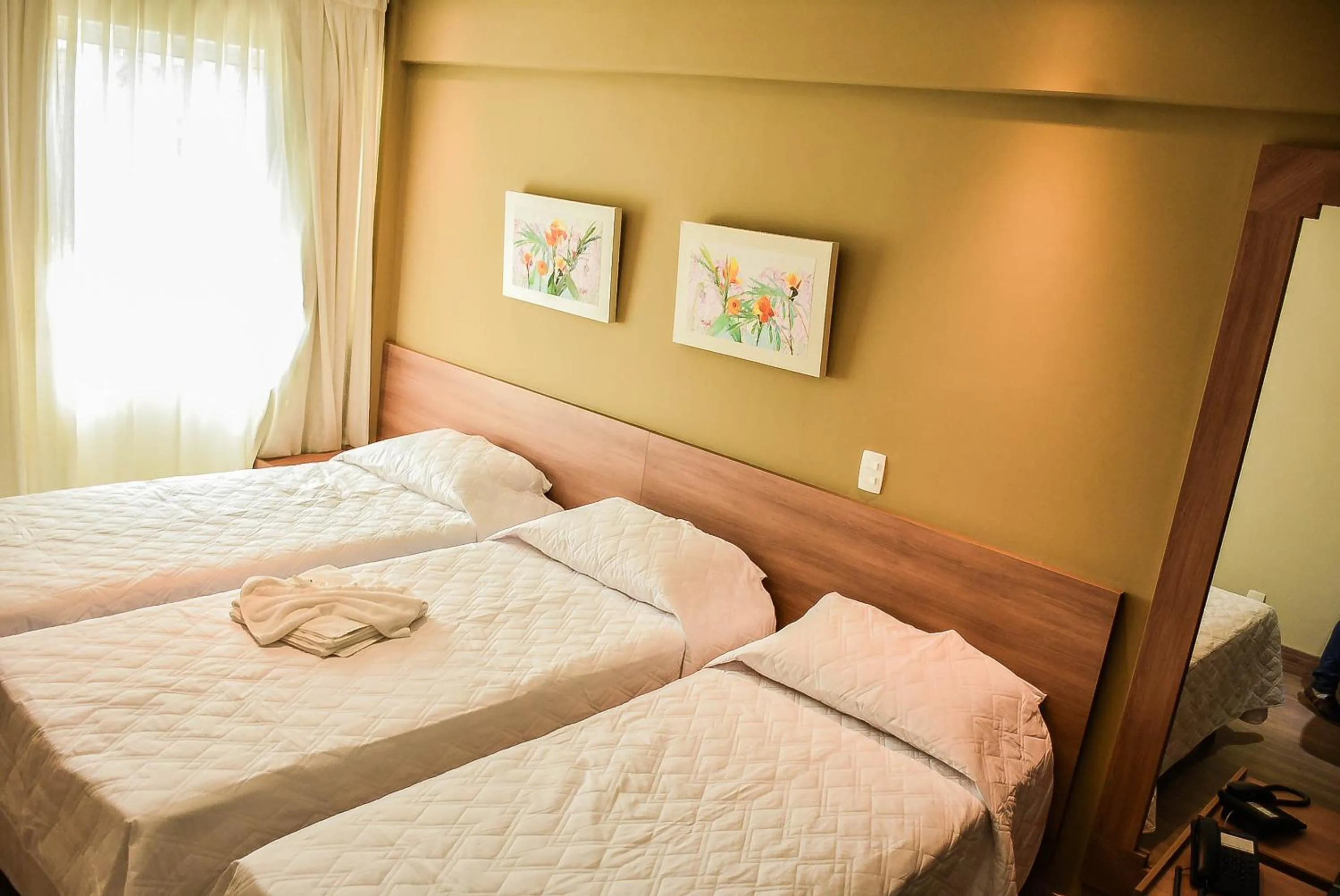 Bed in Mont Blanc Suites Duque de Caxias