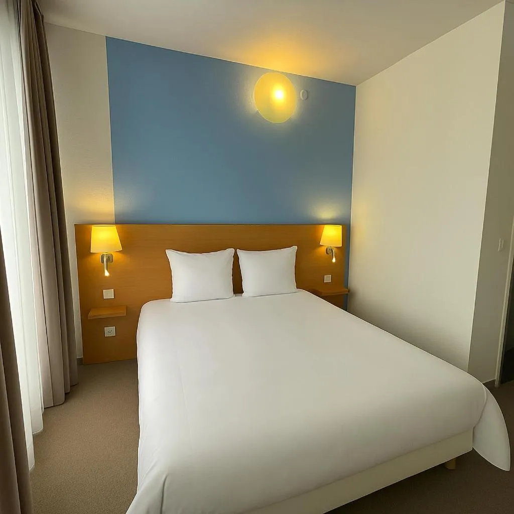 Bedroom, Bed in Brit Hotel Grand Hotel Munster