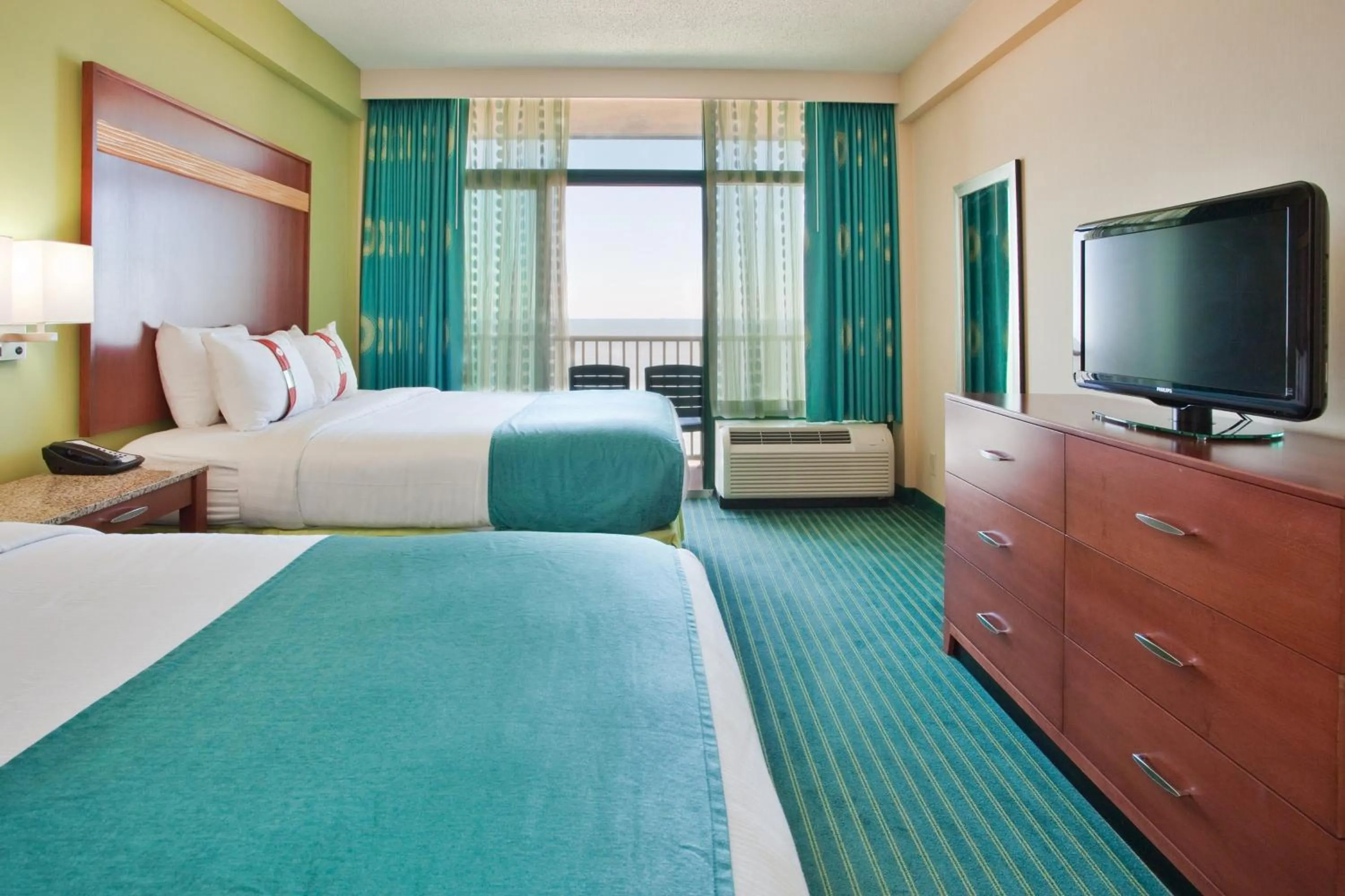 Photo of the whole room, Bed in Holiday Inn & Suites Virginia Beach - North Beach by IHG