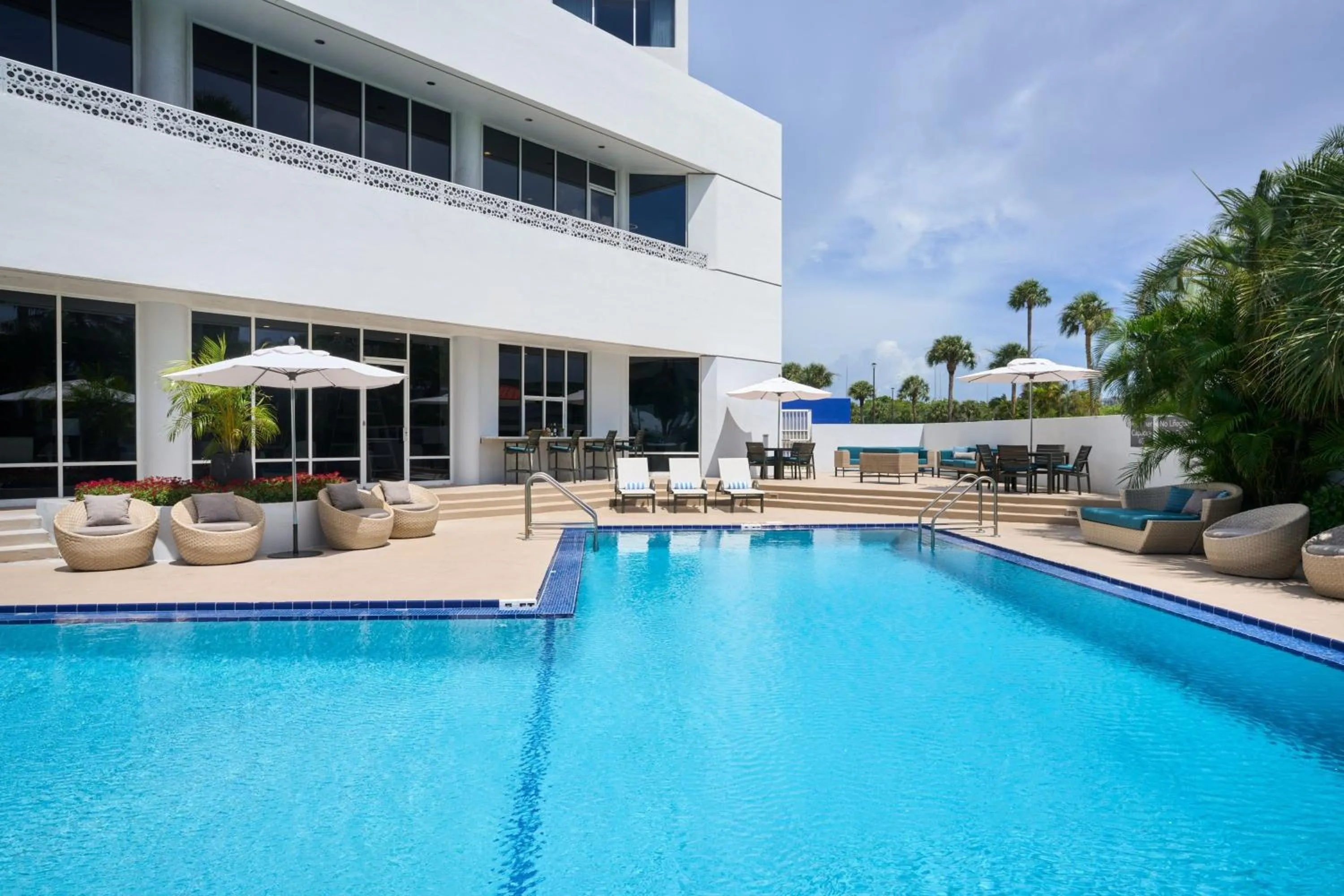 Swimming pool in Holiday Inn Palm Beach-Airport Conf Ctr, an IHG Hotel