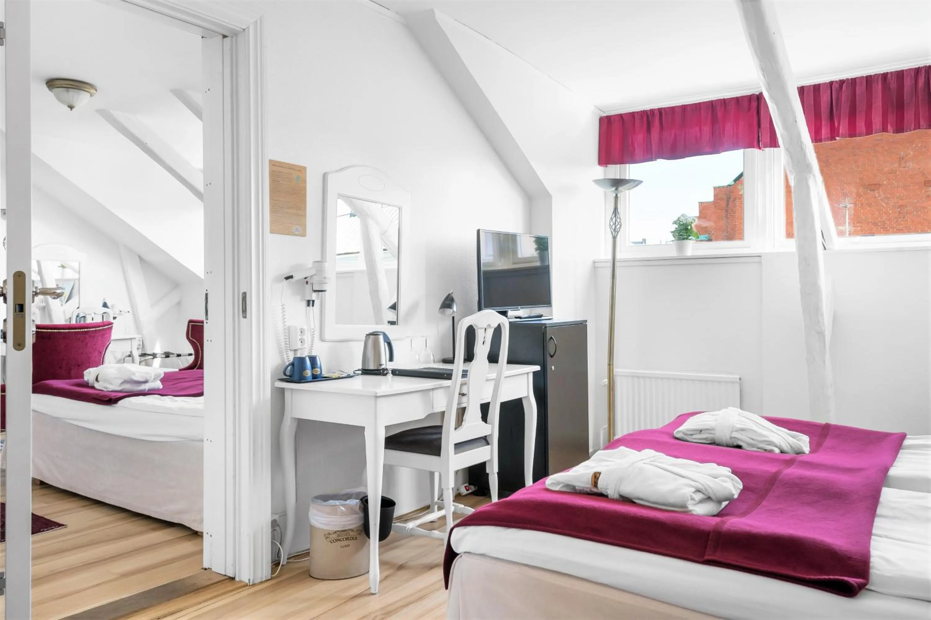 Bed in Hotel Concordia