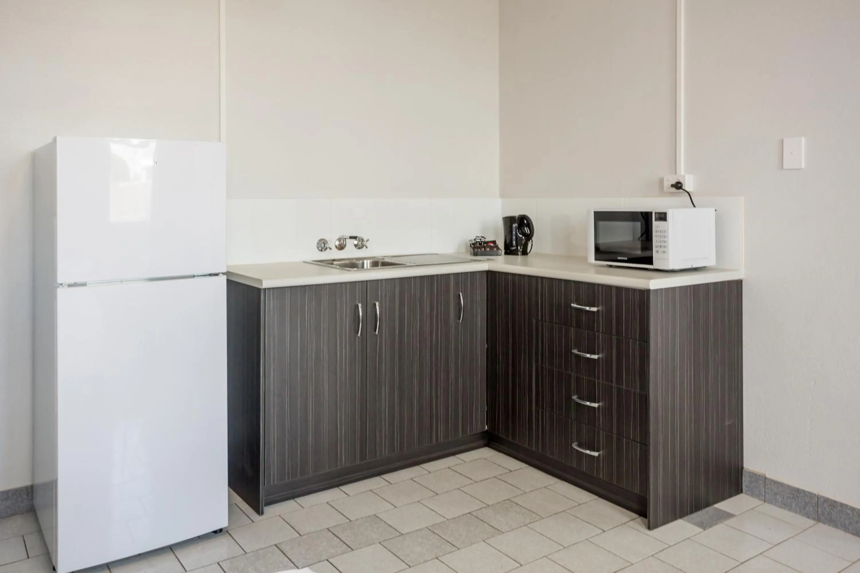 Kitchen or kitchenette in Nightcap at Emerald Star Hotel